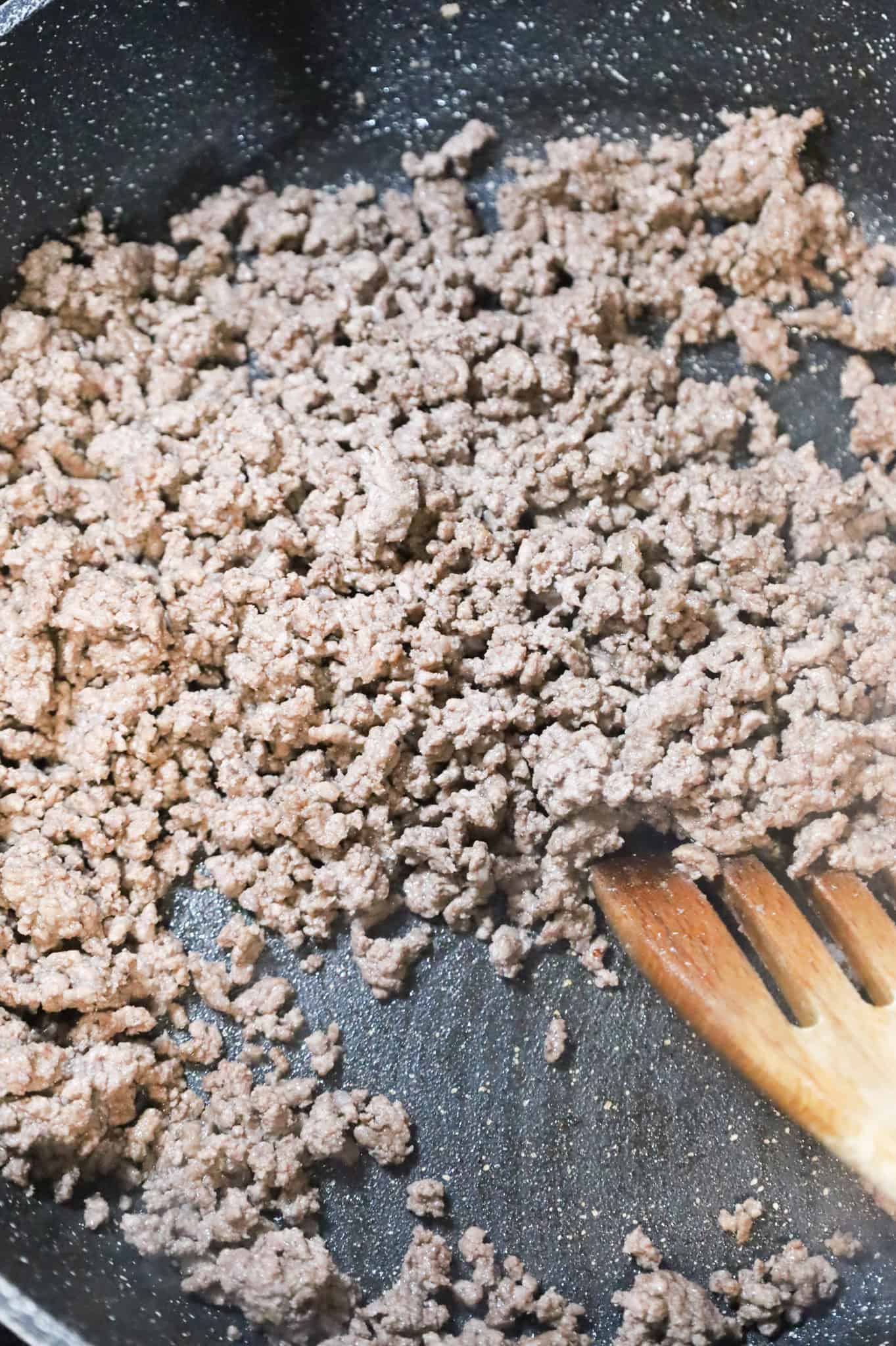 cooked ground beef in a skillet