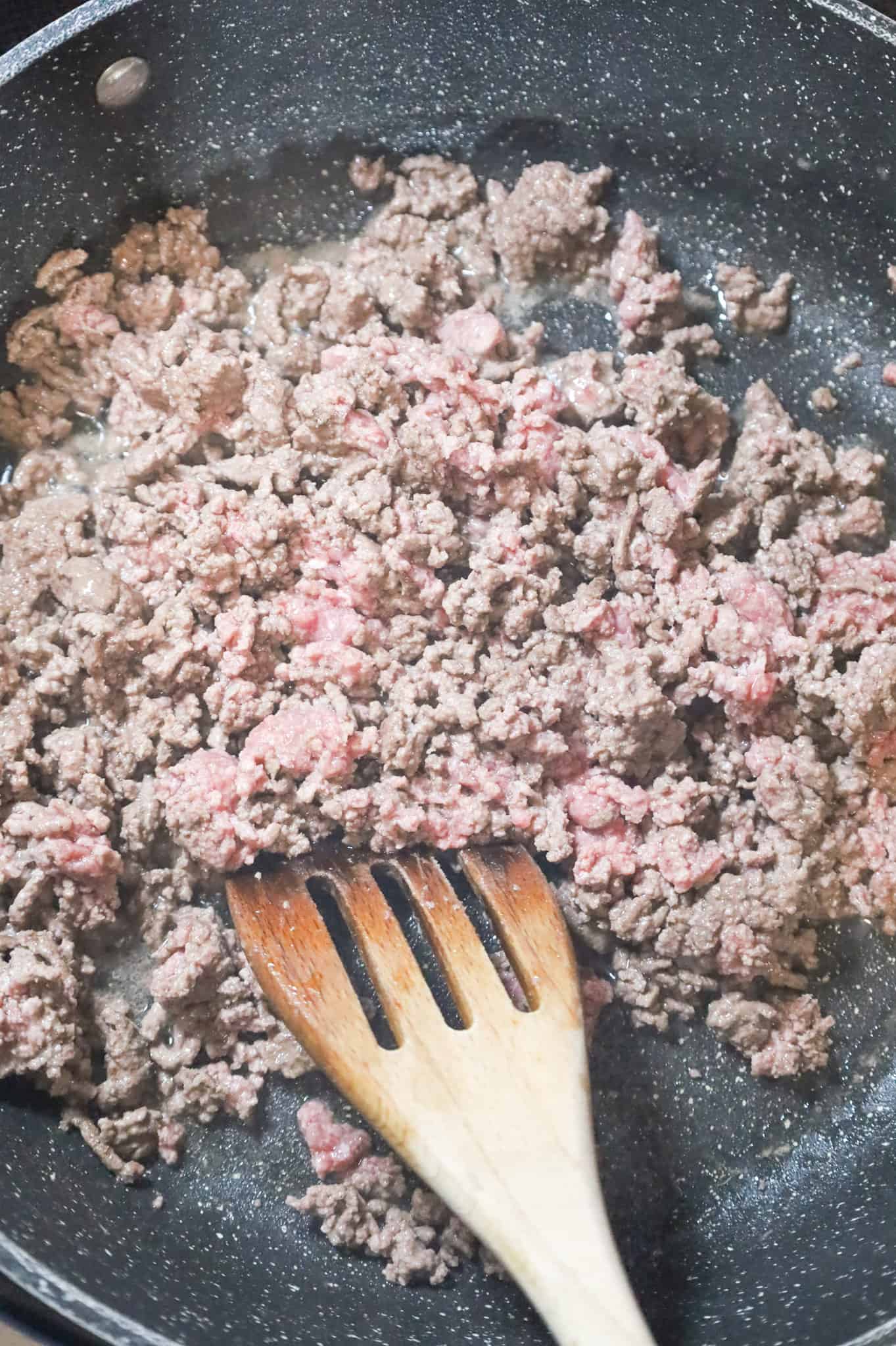 ground beef cooking in a skillet