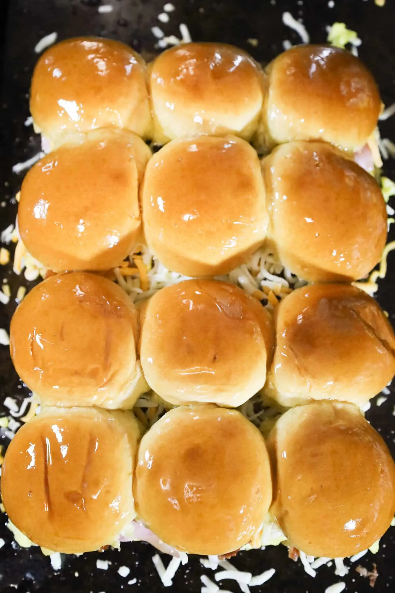 slider buns brushed with melted butter and maple syrup