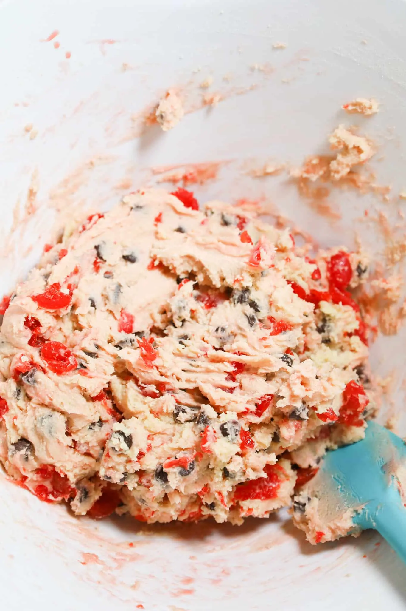 cherry chocolate chip cookie dough in a mixing bowl