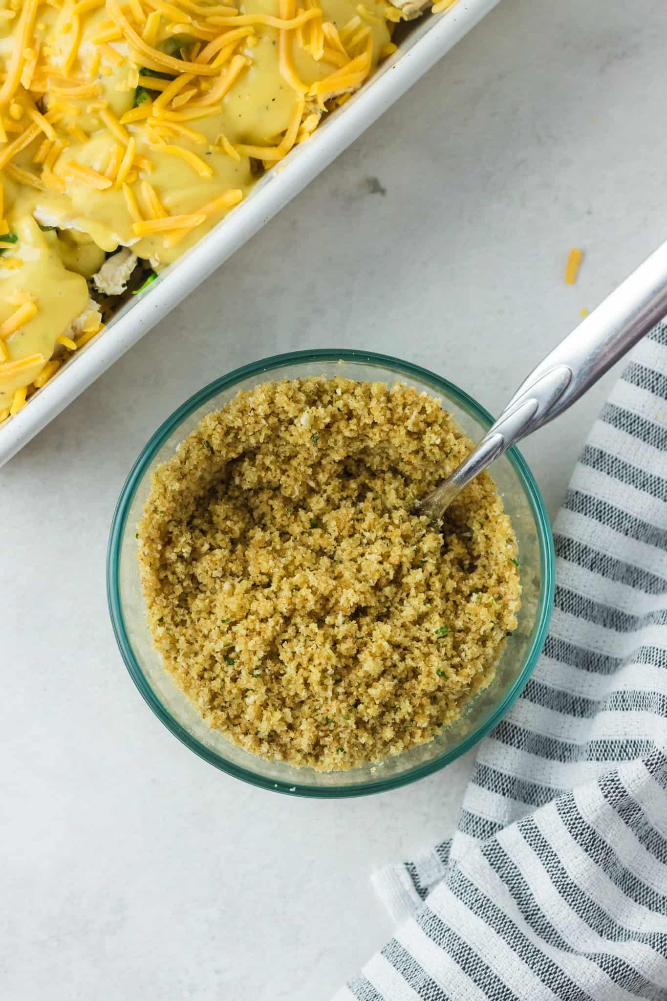 breadcrumb and melted butter mixture in a glass bowl