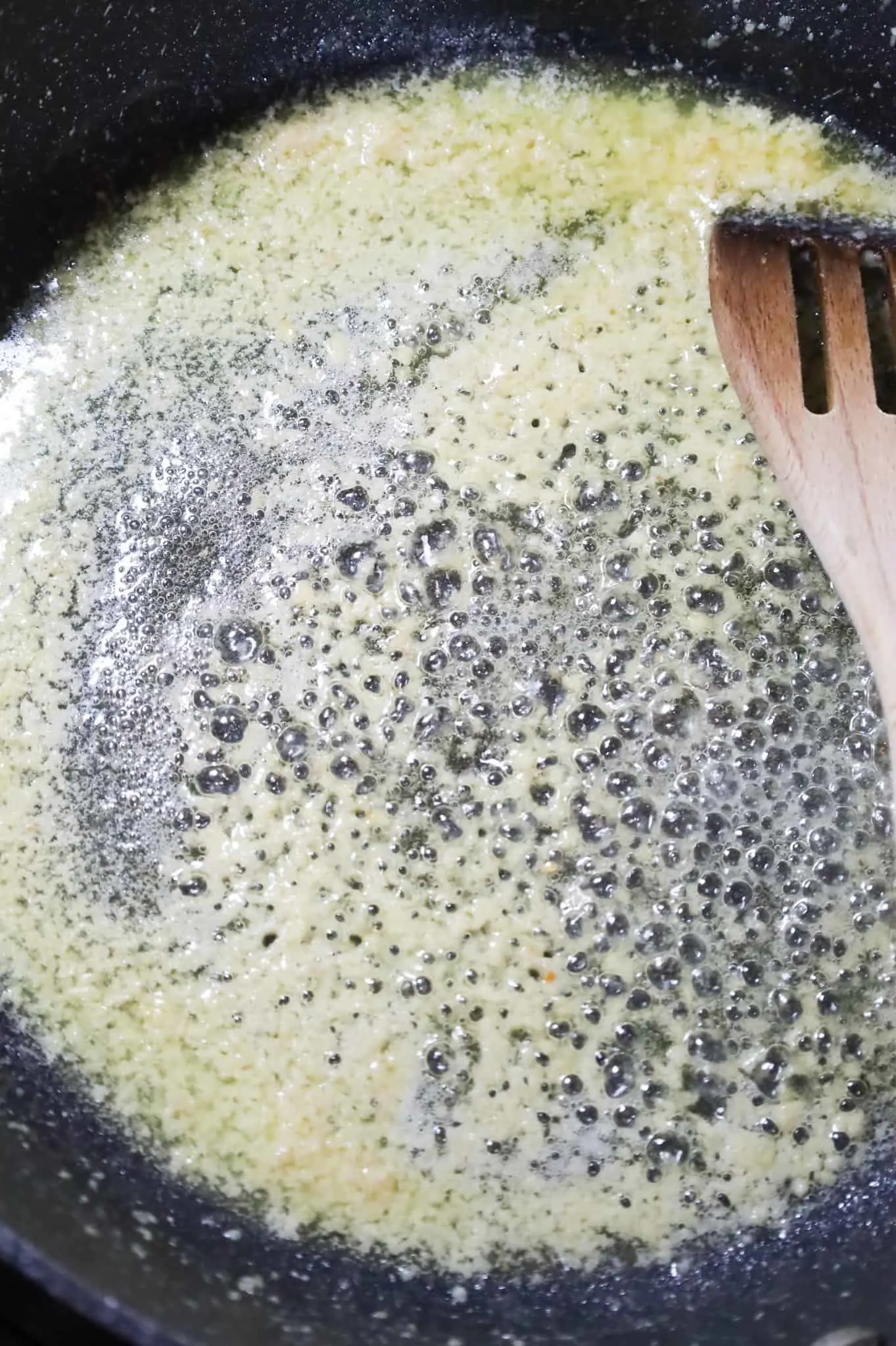 melted butter and garlic puree in a skillet