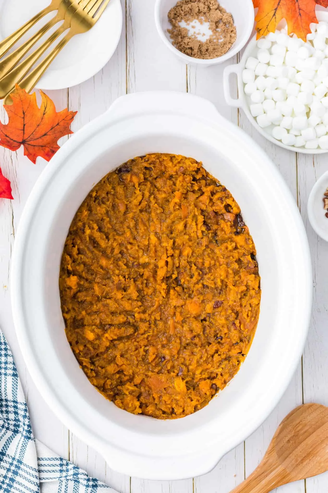 mashed sweet potato and brown sugar mixture in a crock pot