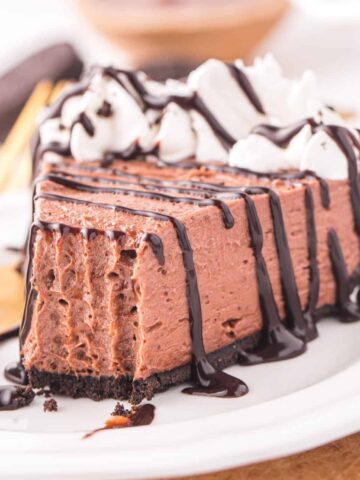 Nutella Pie is an easy no bake dessert recipe made with chocolate hazelnut spread, cream cheese, heavy cream and instant chocolate pudding mix all in a store bought Oreo crust.