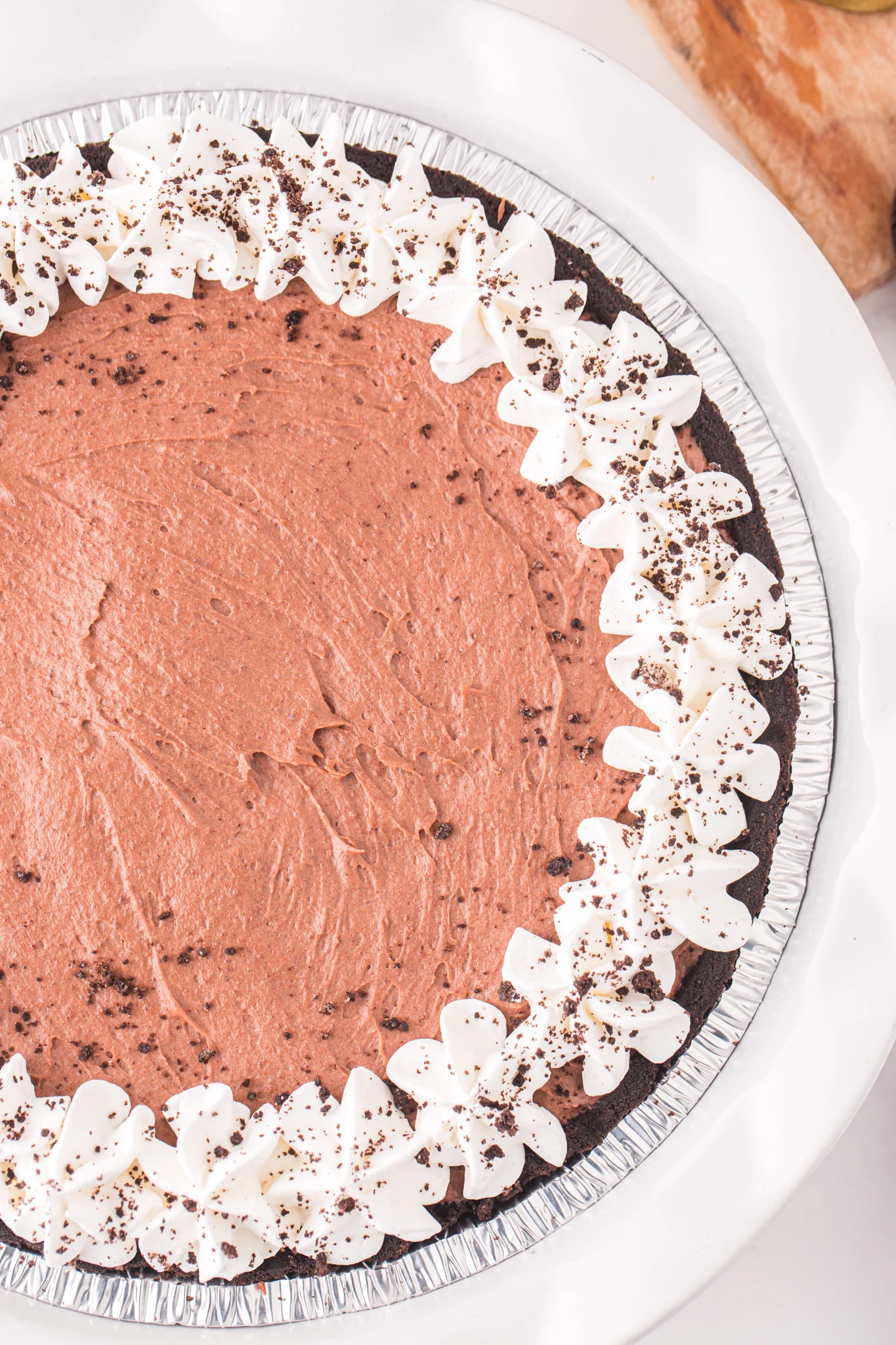 Nutella Pie is an easy no bake dessert recipe made with chocolate hazelnut spread, cream cheese, heavy cream and instant chocolate pudding mix all in a store bought Oreo crust.