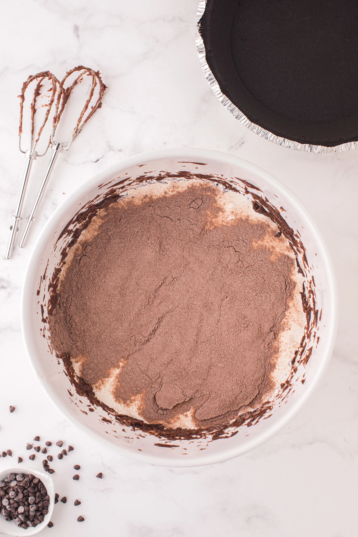 heavy cream and instant chocolate pudding mix in a mixing bowl