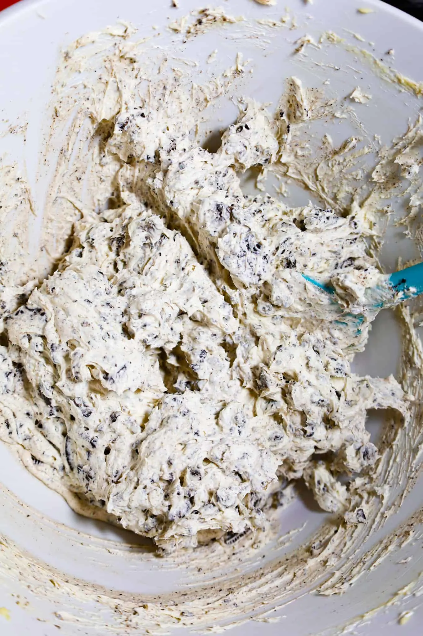Oreo, cream cheese and Cool Whip mixture in a mixing bowl