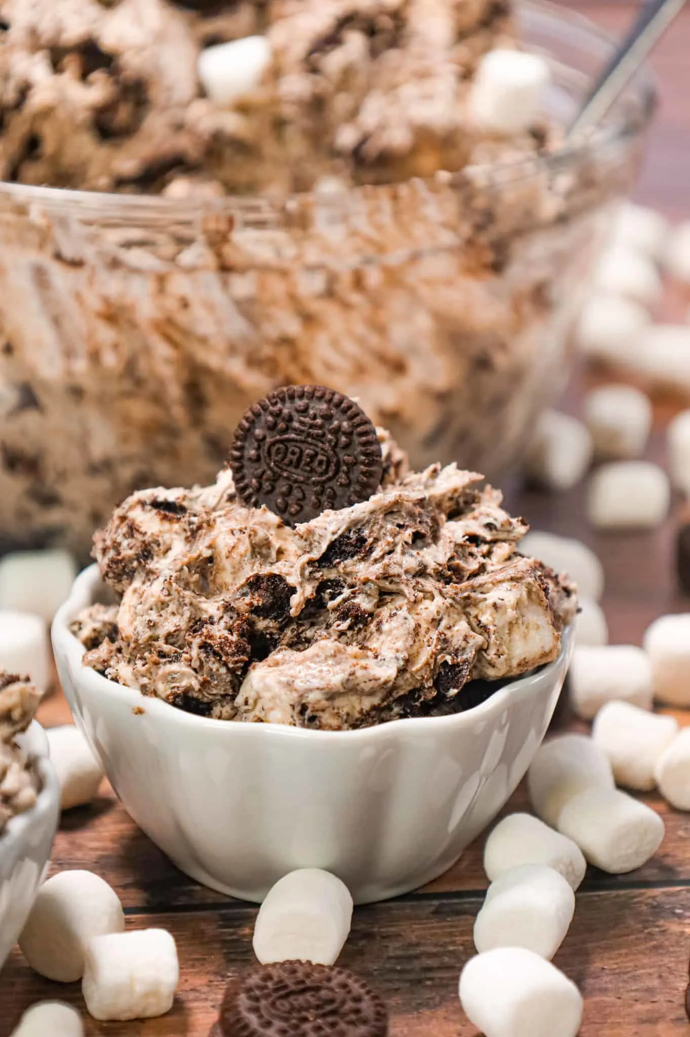 Oreo Fluff is an easy no bake dessert recipe made with cream cheese, instant vanilla pudding and Cool Whip and loaded with mini marshmallows and crumbled Oreo Cookies!