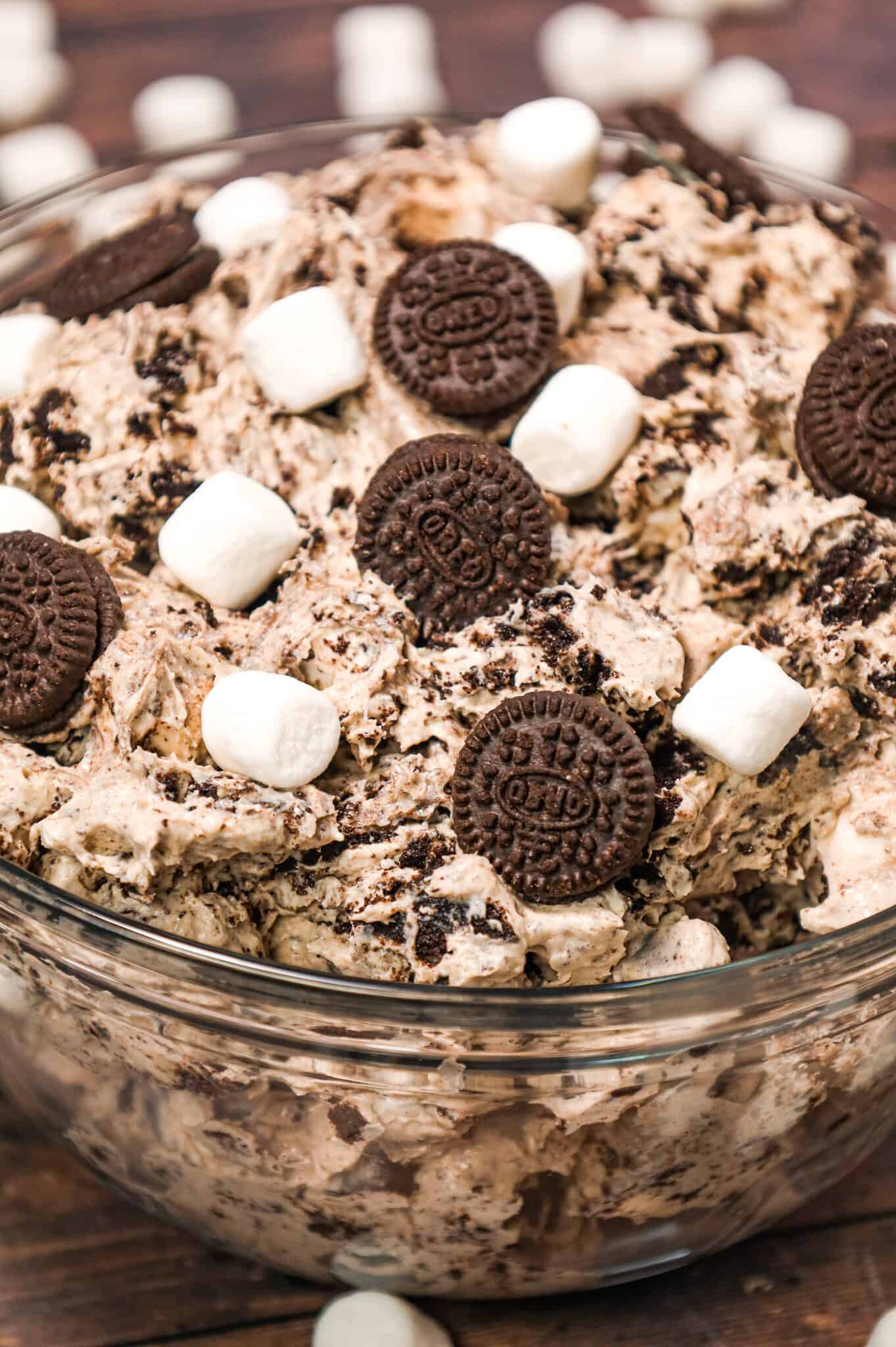 Oreo Fluff is an easy no bake dessert recipe made with cream cheese, instant vanilla pudding and Cool Whip and loaded with mini marshmallows and crumbled Oreo Cookies!