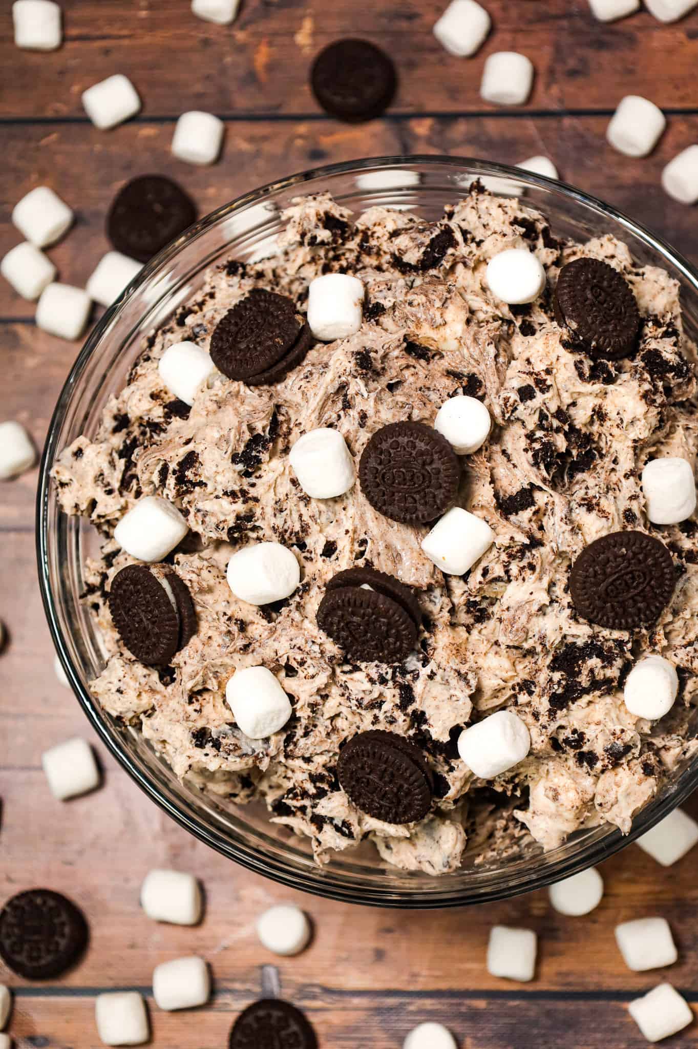 Oreo Fluff is an easy no bake dessert recipe made with cream cheese, instant vanilla pudding and Cool Whip and loaded with mini marshmallows and crumbled Oreo Cookies!