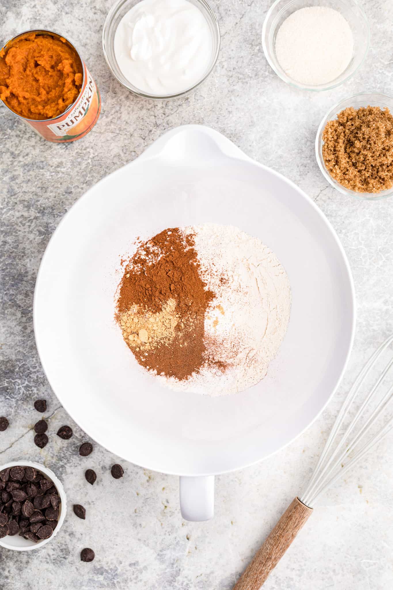 pumpkin bread dry ingredients in a mixing bowl