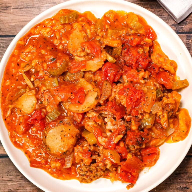 Shipwreck Casserole is a hearty ground beef casserole loaded with sliced potatoes, long grain rice, diced tomatoes, celery and tomato soup.