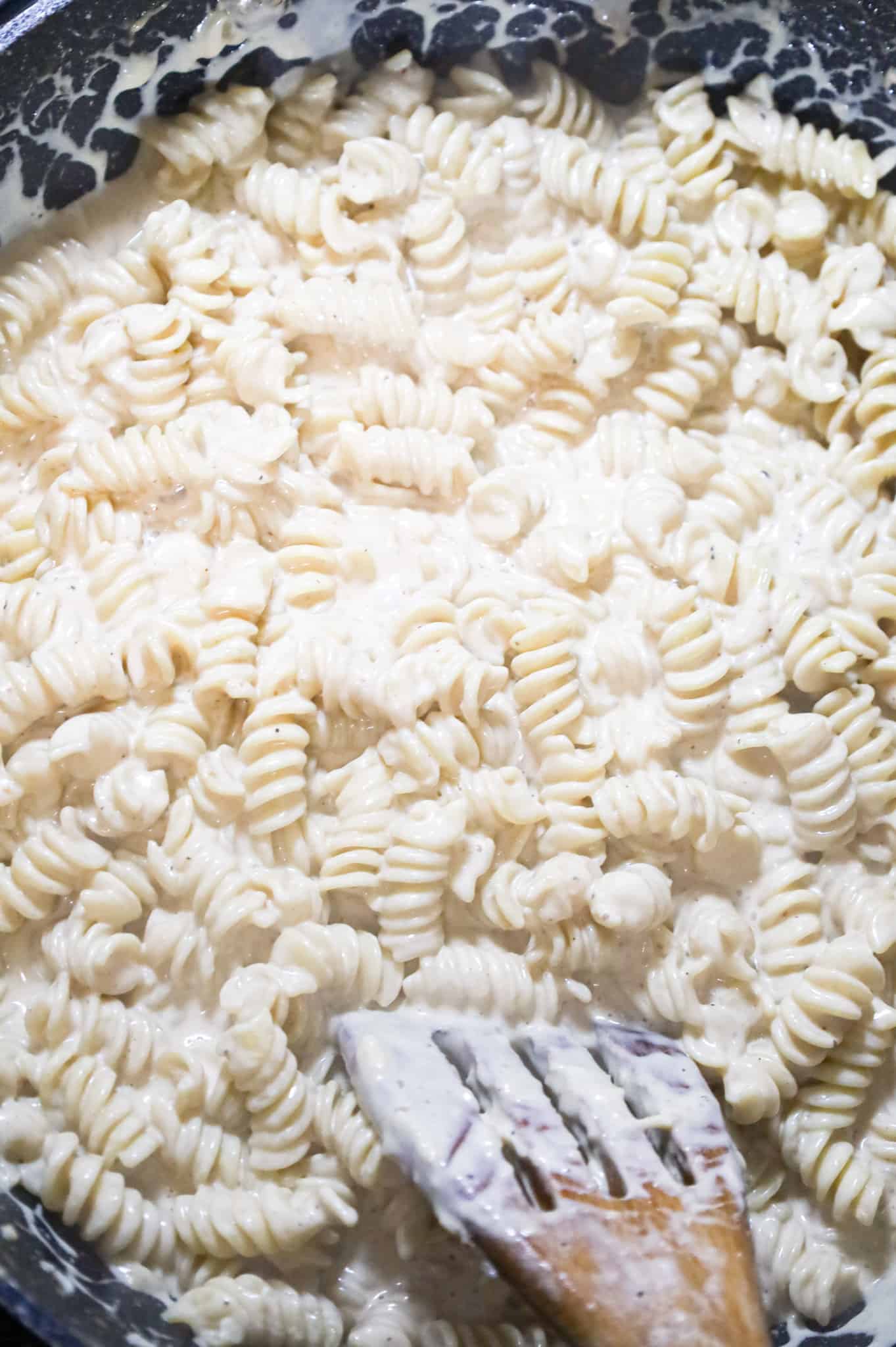 rotini pasta in cream sauce in a killet