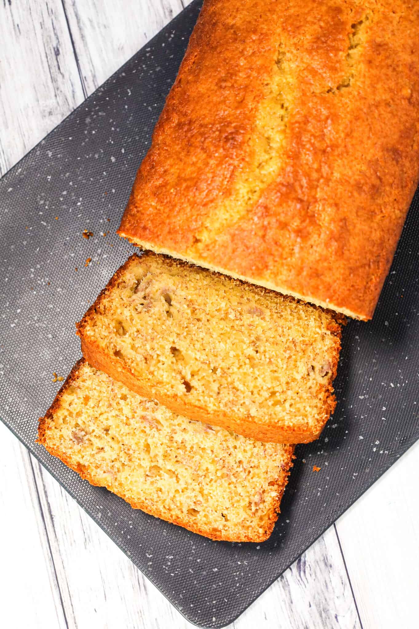 4 Ingredient Banana Bread is an easy banana bread recipe using butter, ripe bananas, eggs and boxed yellow cake mix.