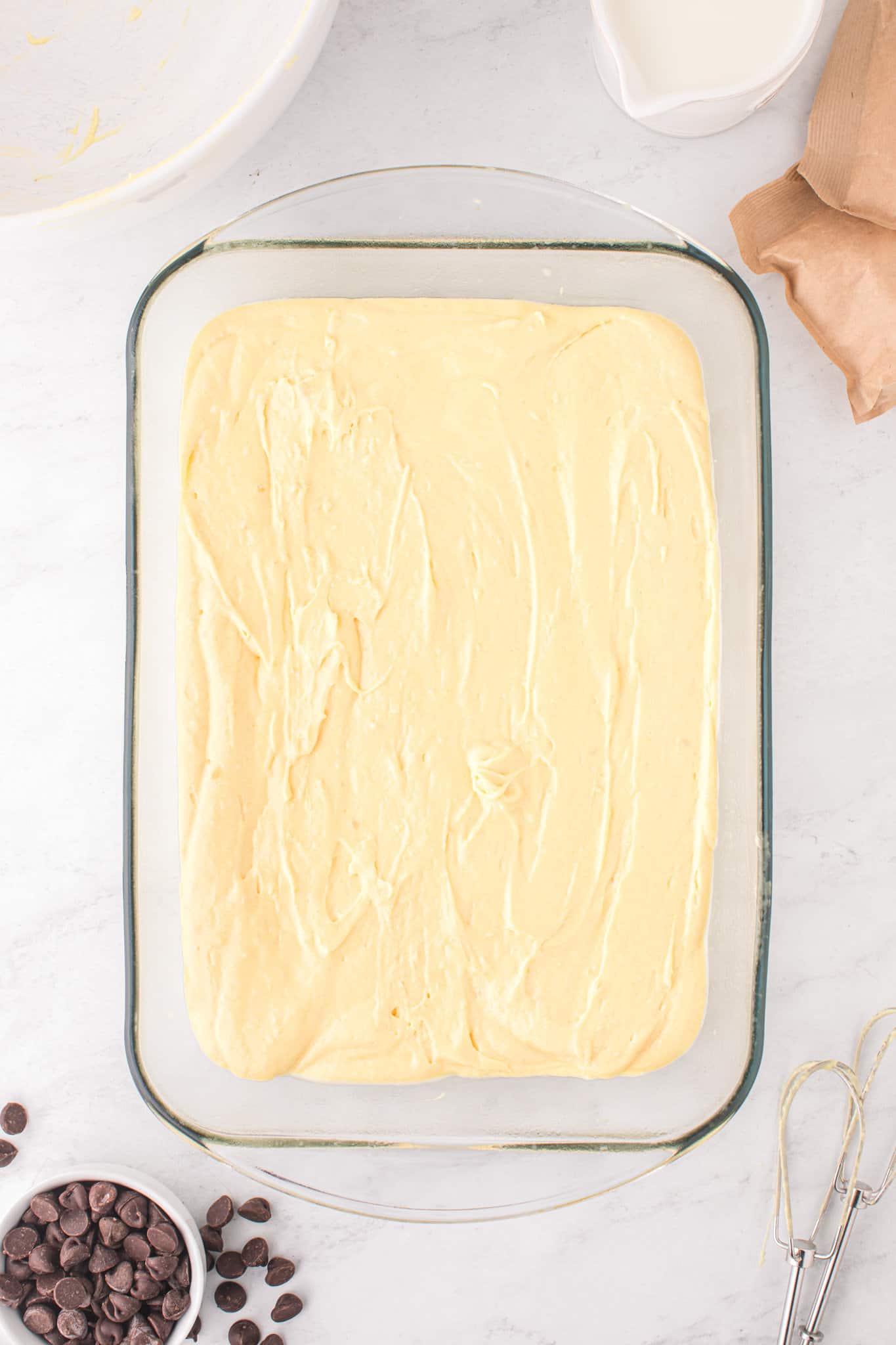 yellow cake batter in a 9 x 13 inch baking dish