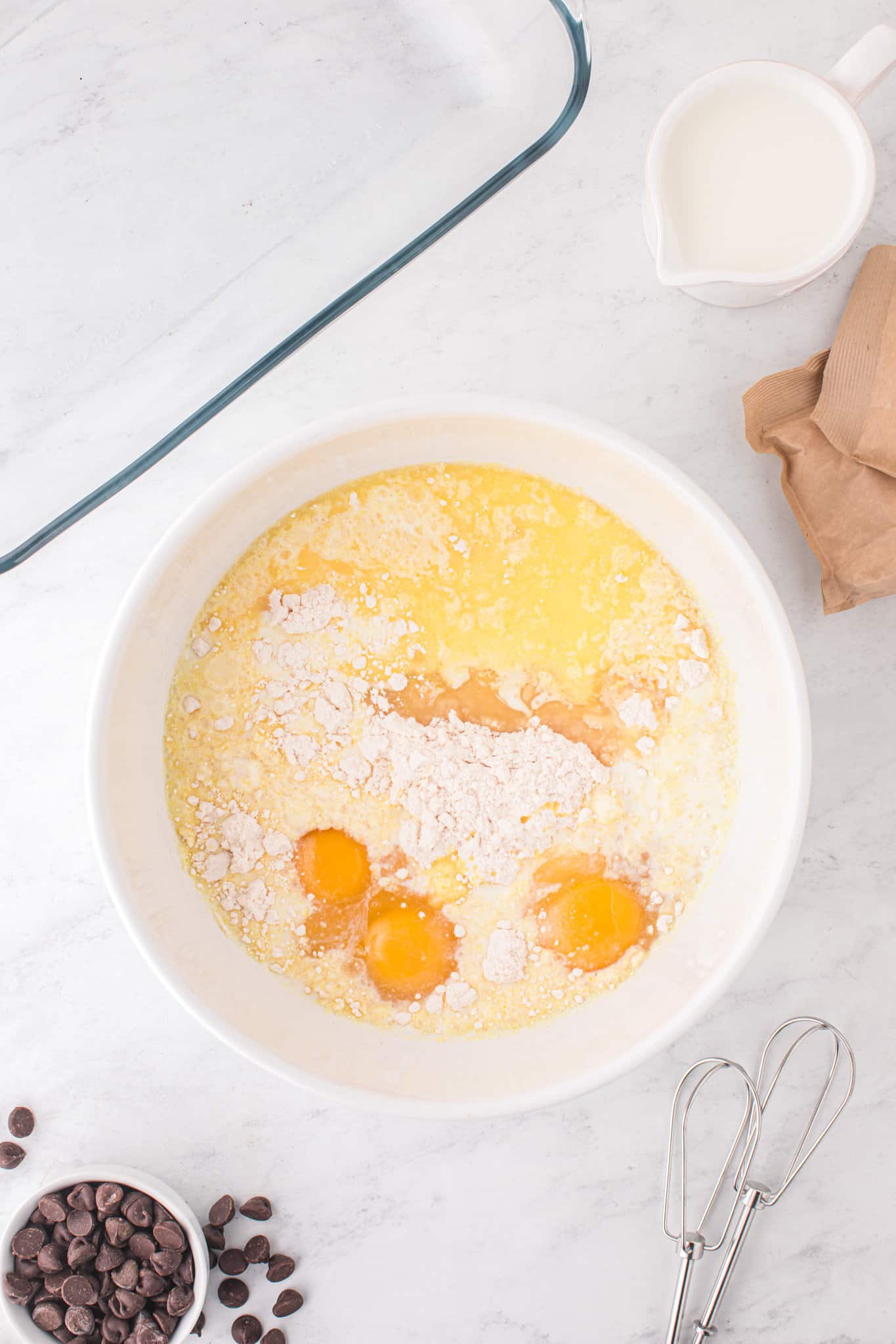 cake mix, eggs, cream and melted butter in a mixing bowl