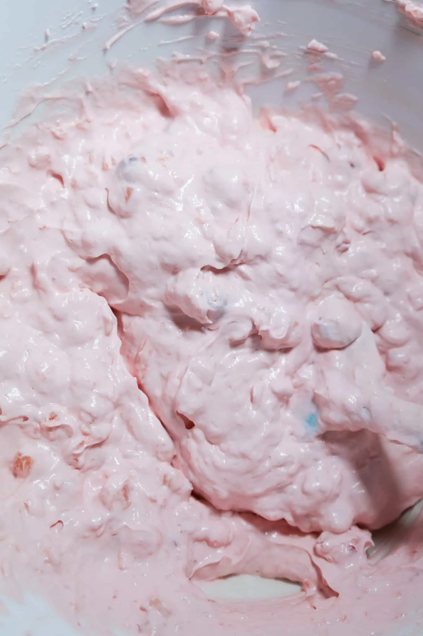 cherry fluff mixture in a mixing bow