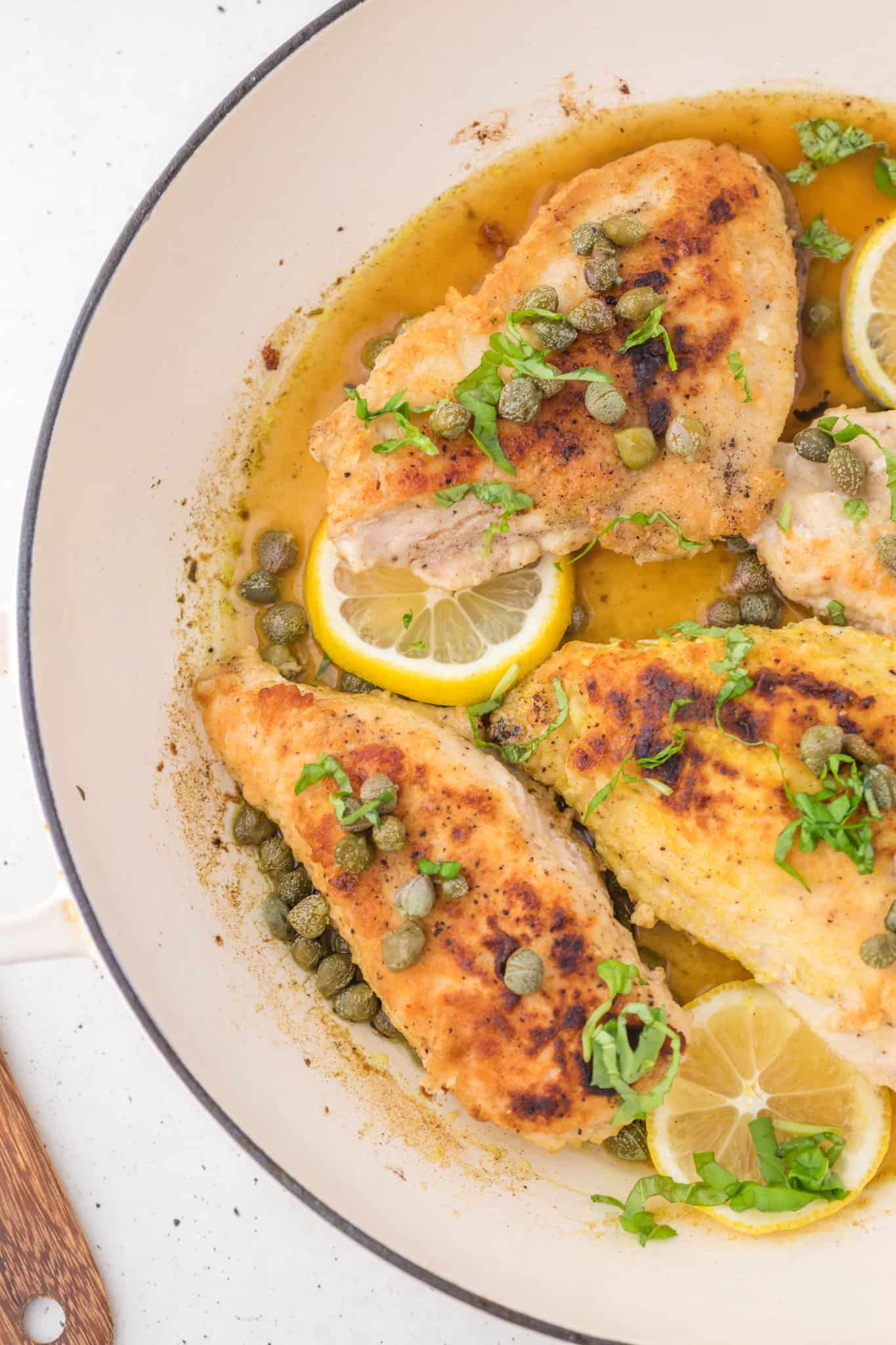 Chicken Piccata is a delicious chicken dinner recipe using boneless, skinless chicken breasts dredged in flour, cooked until golden browned and served in a tasty lemon sauce with capers.