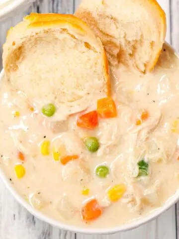 Chicken Pot Pie Soup is a hearty creamy soup recipe loaded with shredded rotisserie chicken and frozen mixed vegetables.