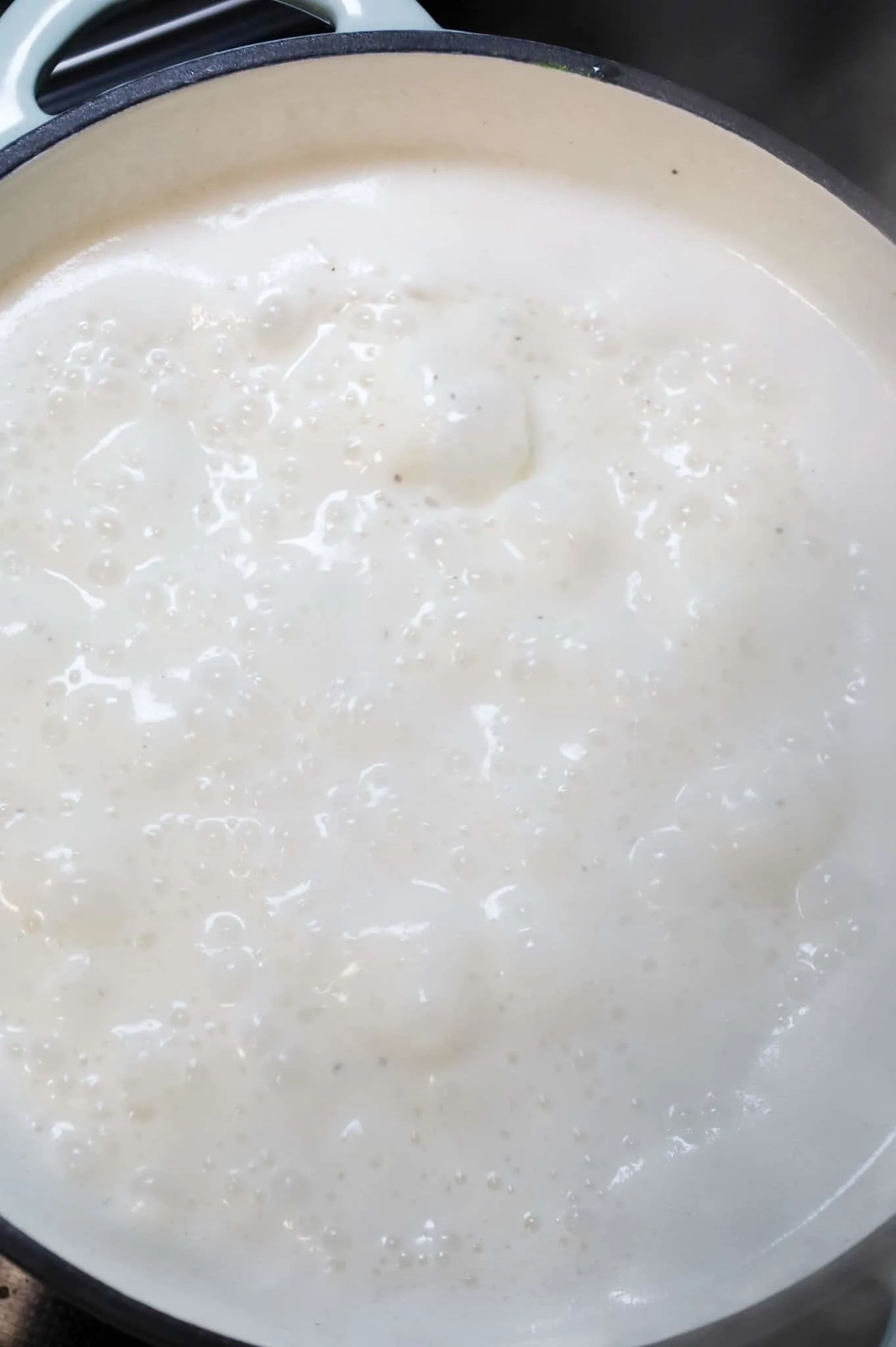 cream soup bubbling in a pot