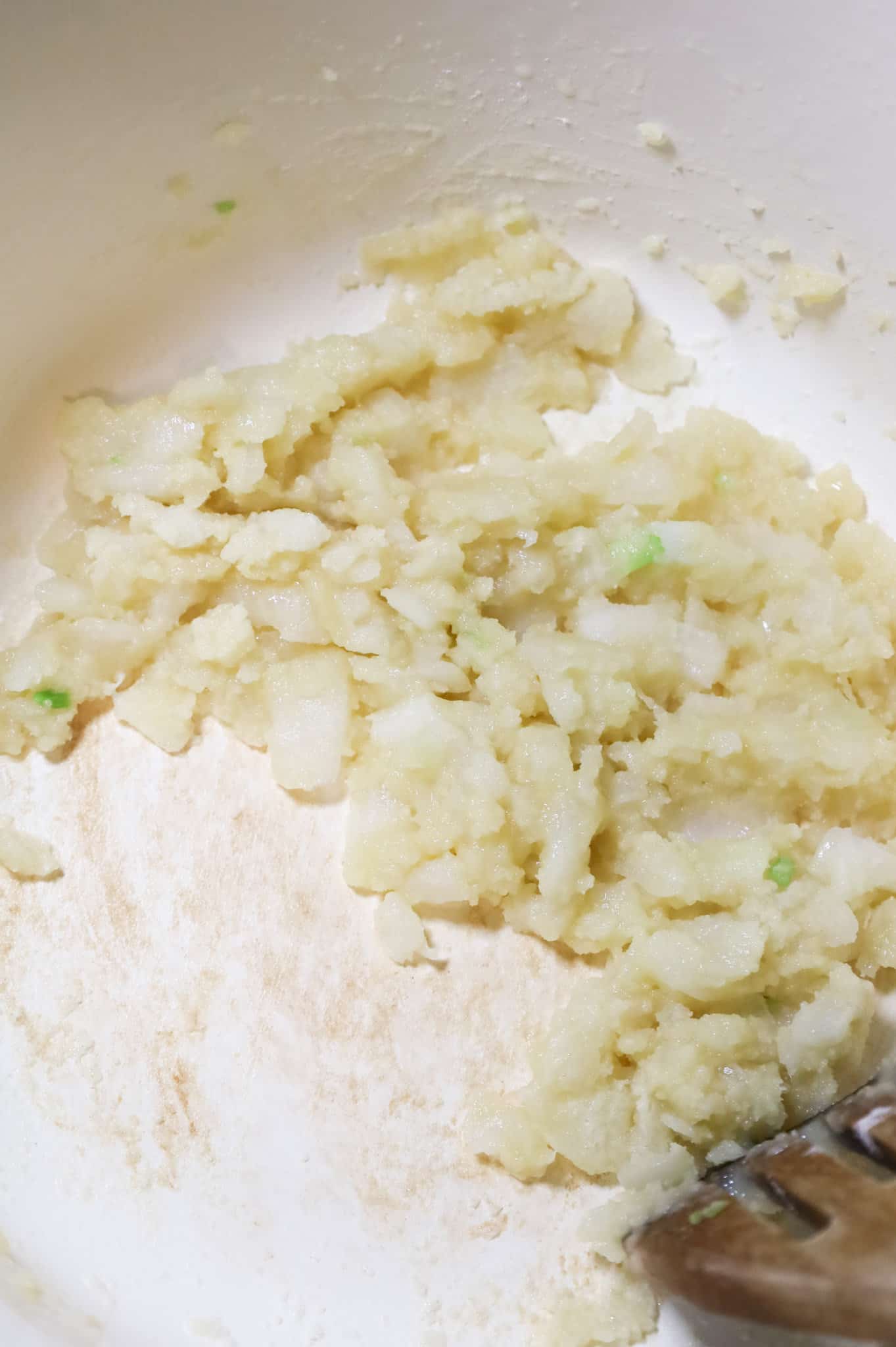 flour, butter and onion mixture cooking in a pot