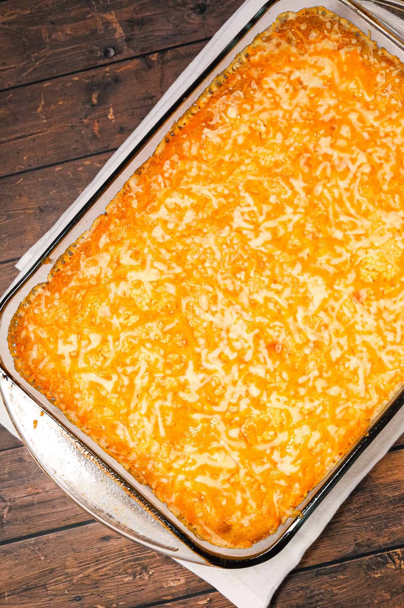 Chili Cornbread Casserole is an easy ground beef dinner recipe loaded with salsa, mixed beans, corn, chili seasoning and topped with cornbread and shredded cheese.