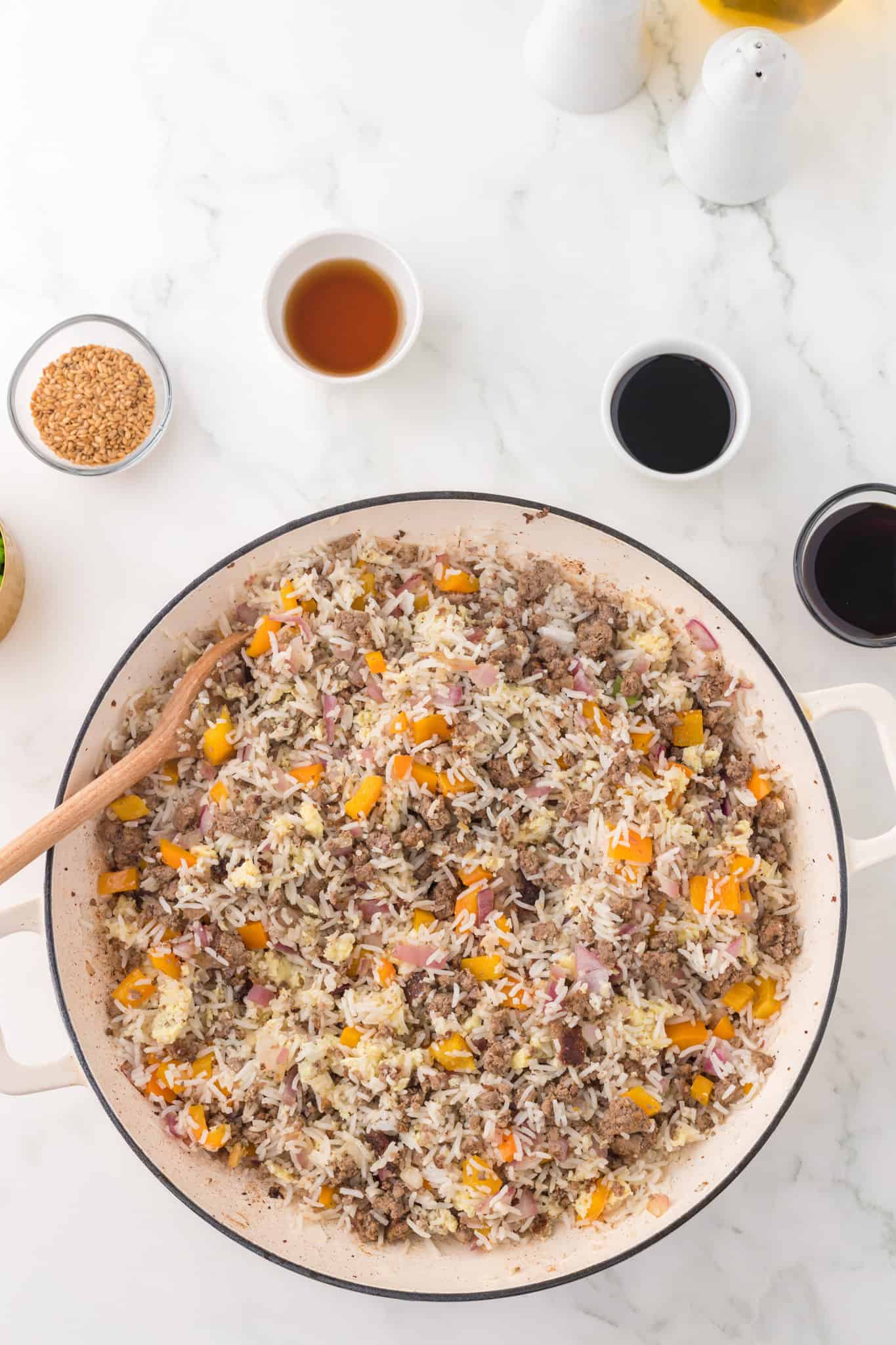 scrambled egg, ground beef and rice mixture in a skillet