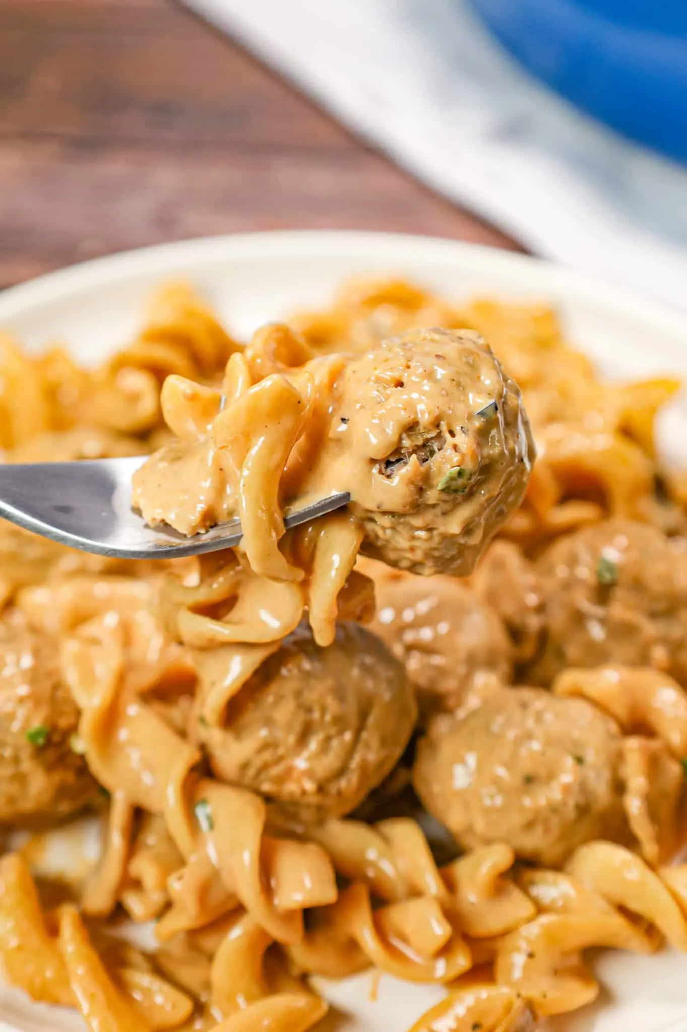 Meatball Stroganoff is an easy dinner recipe with egg noodles, diced onions, sliced mushrooms and store bought meatballs all tossed in a beef gravy and sour cream mixture.
