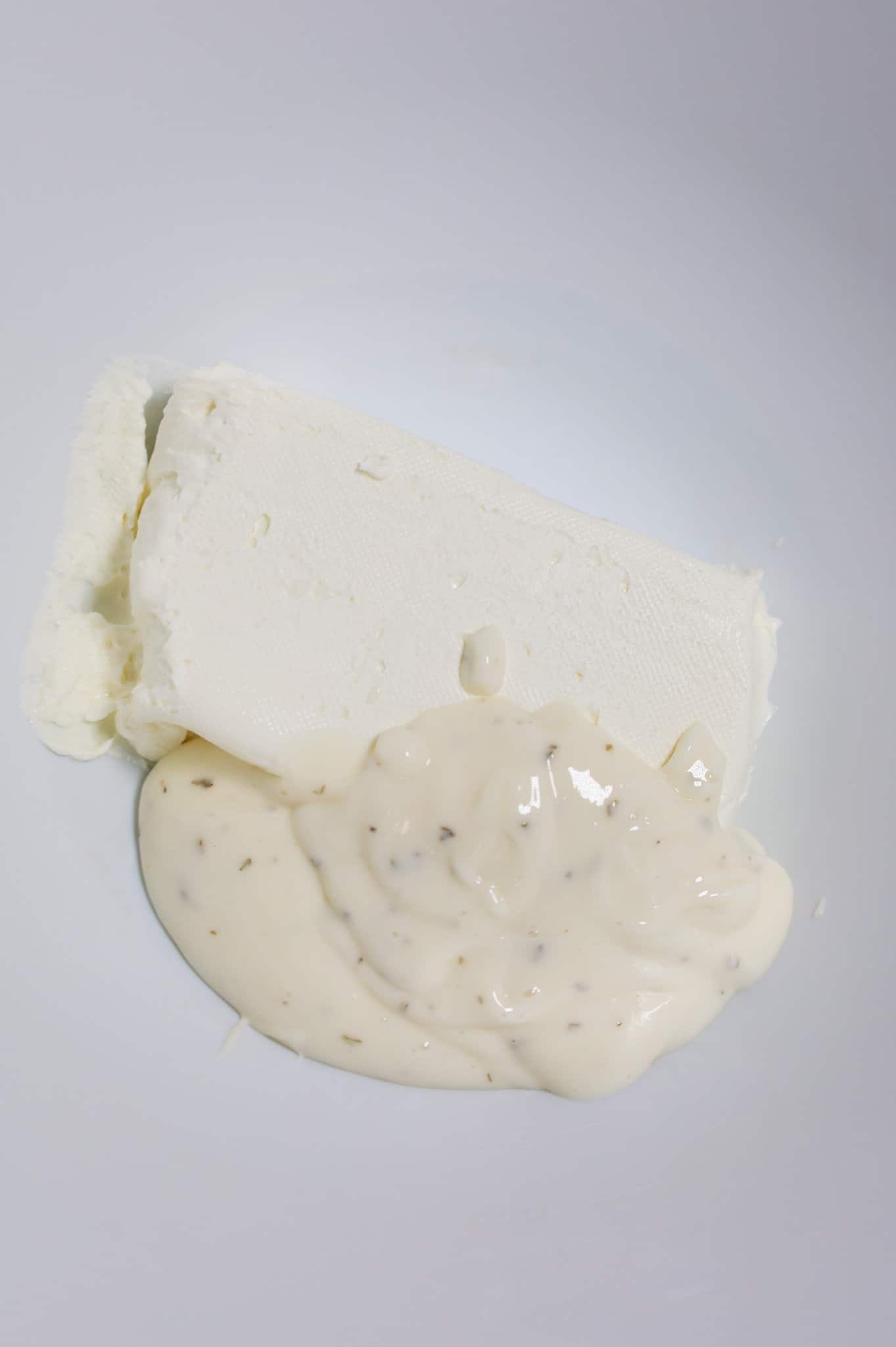 softened cream cheese and ranch dressing in a mixing bowl