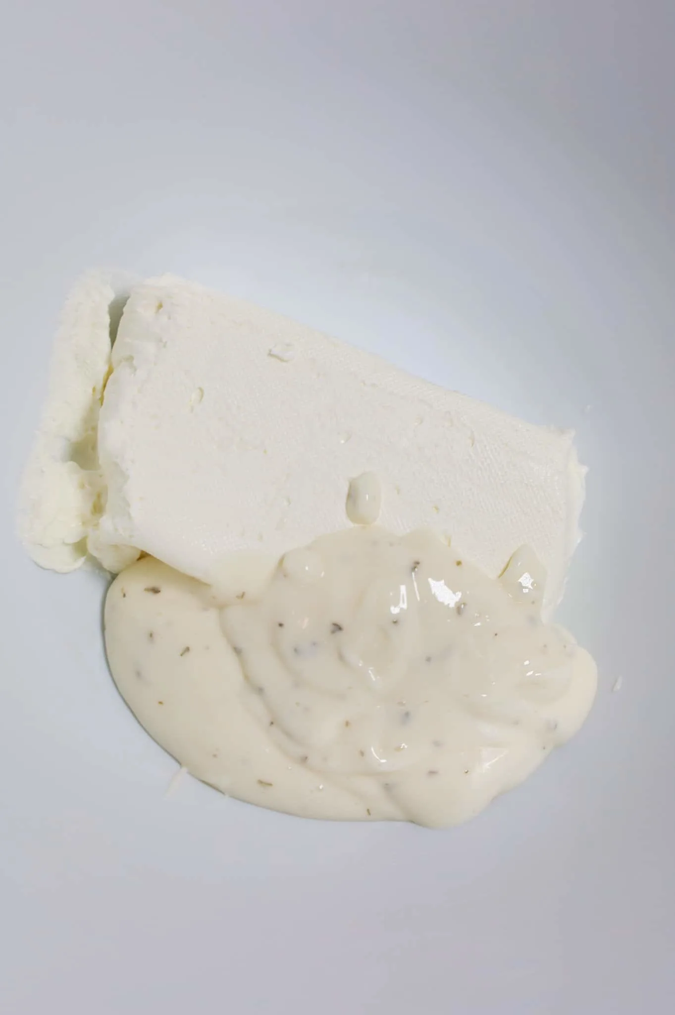 softened cream cheese and ranch dressing in a mixing bowl