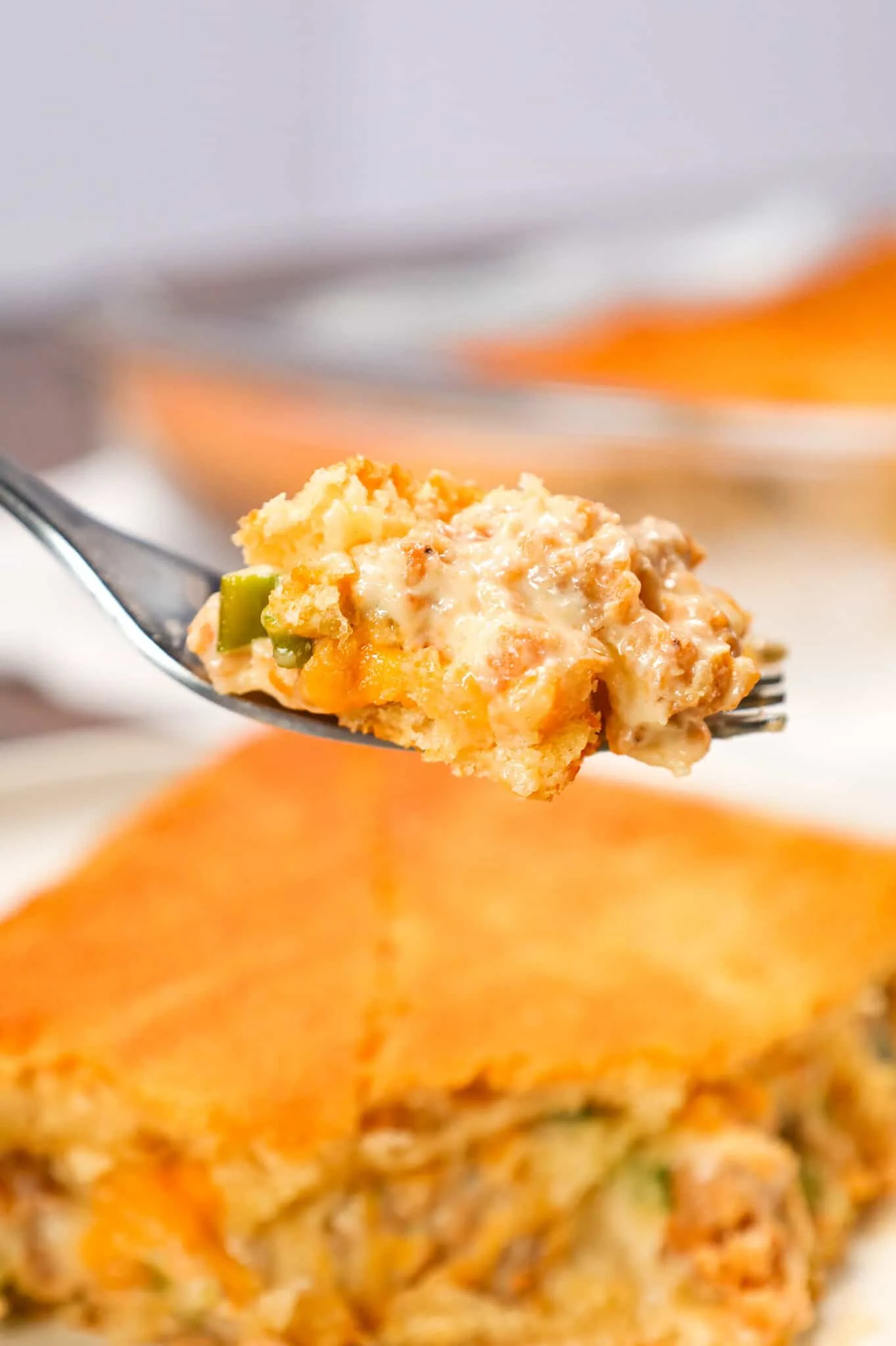 Sausage Cream Cheese Casserole is a delicious breakfast casserole loaded with pork sausage meat, cream cheese, maple syrup, cheddar cheese and green onions all baked between two layers of Pillsbury crescent rolls.