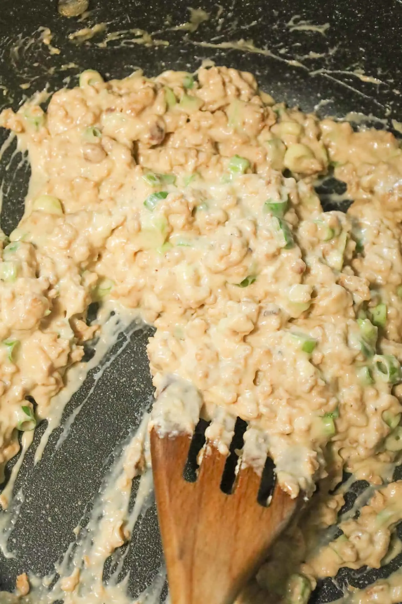 cream cheese, sausage and green onion mixture in a skillet