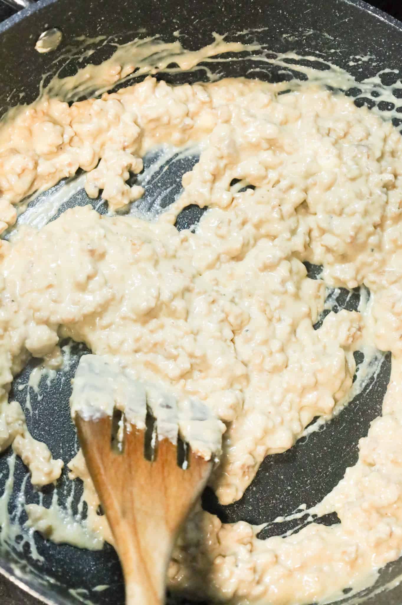 cream cheese and sausage mixture in a skillet