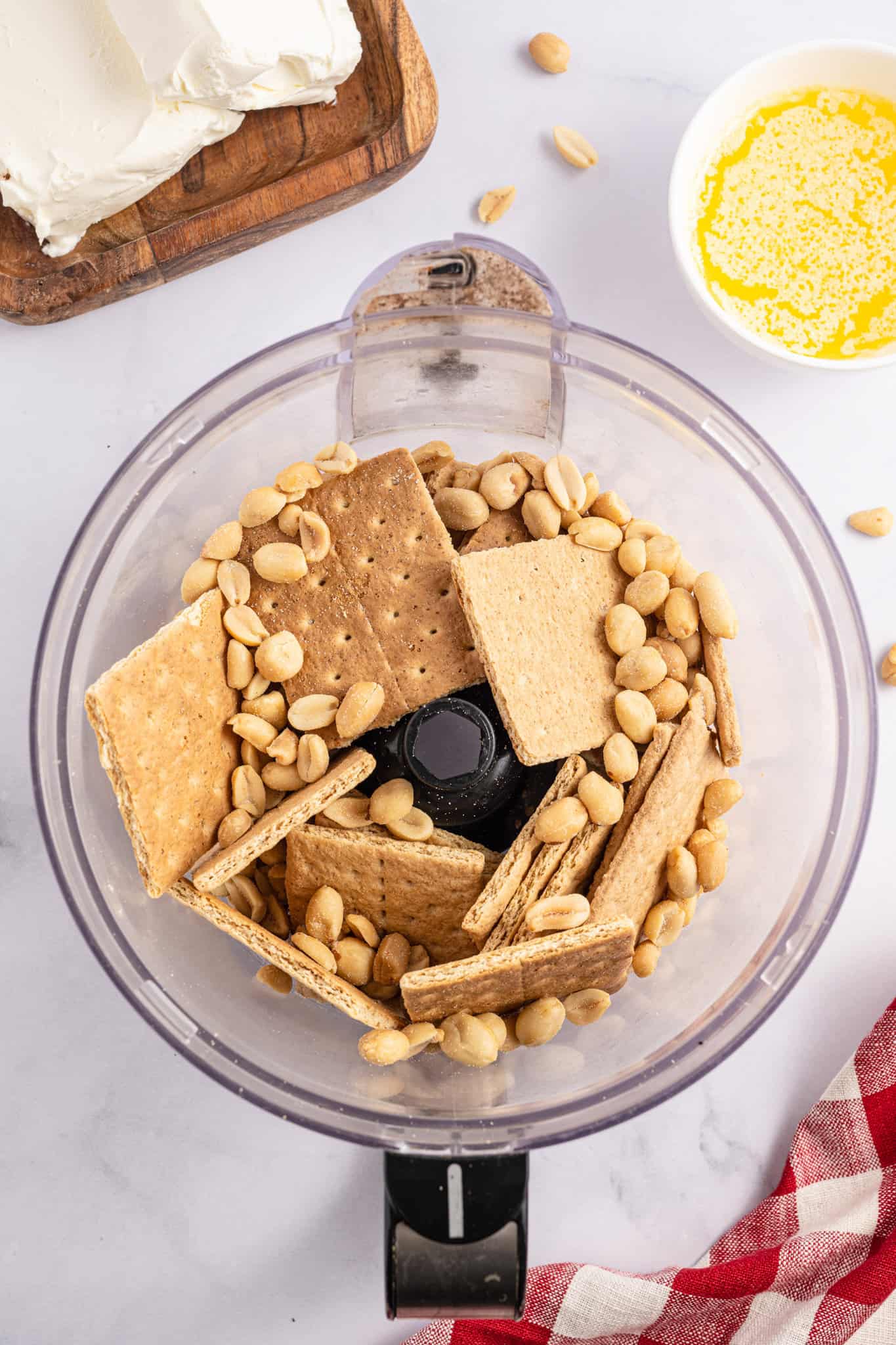 graham crackers and peanuts in a food processor