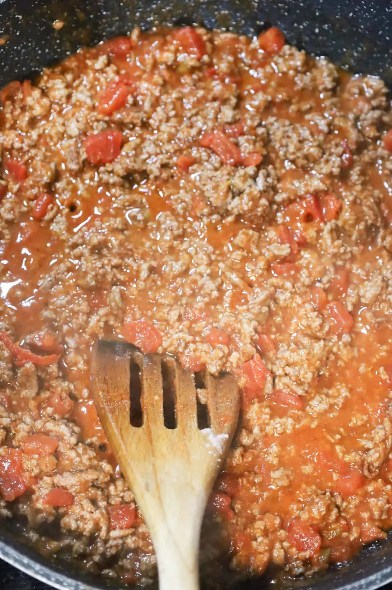 ground beef and tomato sauce mixture in a skillet