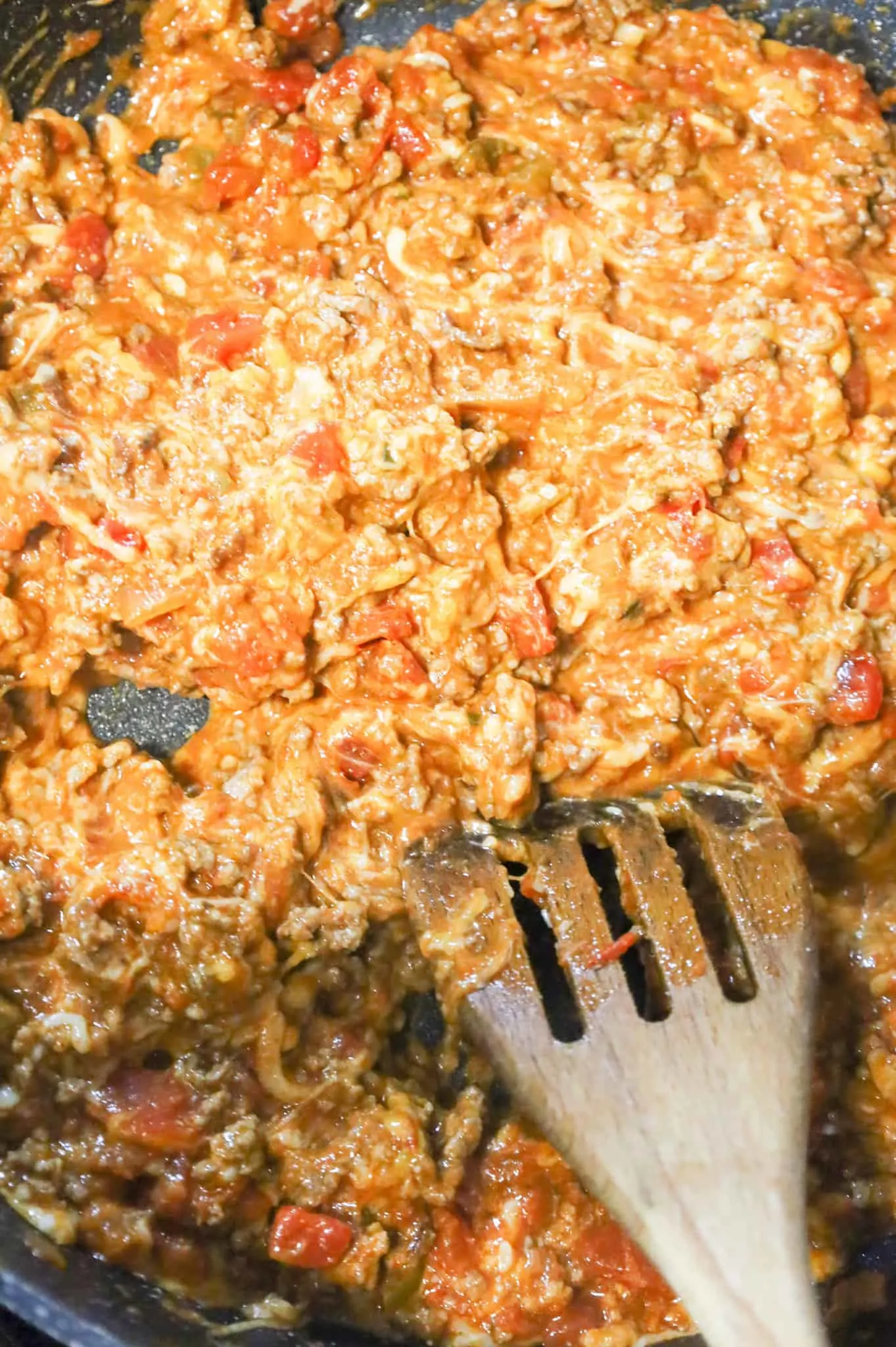 cheesy ground beef mixture in a skillet