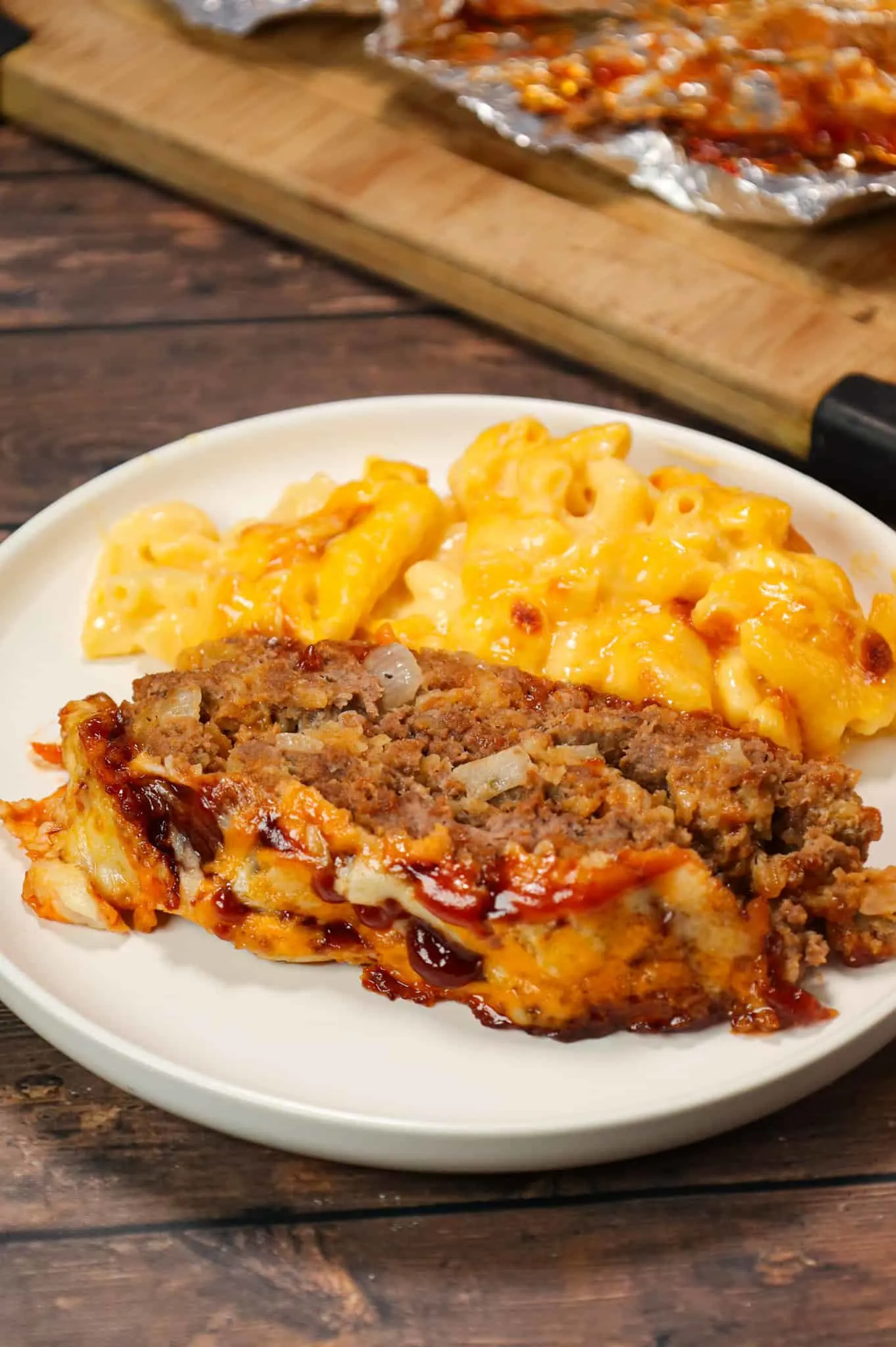 BBQ Meatloaf is a hearty ground beef dinner recipe loaded with crushed BBQ flavoured potato chips, BBQ sauce and shredded cheddar cheese.