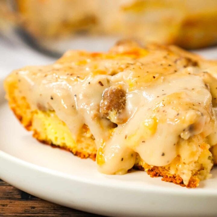 Biscuit and Gravy Casserole is a hearty breakfast dish made with Pillsbury biscuits and loaded with crumbled sausage, cheddar cheese and peppered gravy.