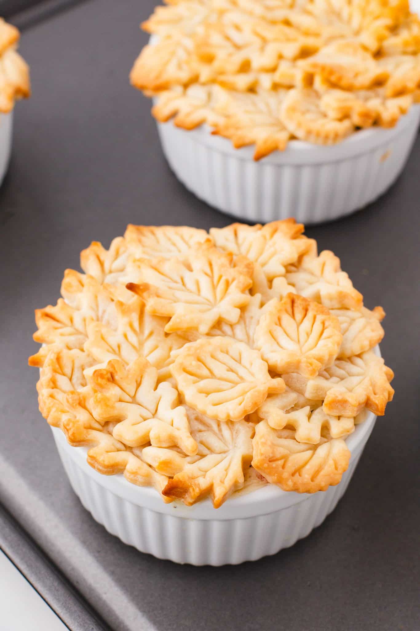 Easy Chicken Pot Pie is a hearty comfort food dish with a creamy chicken and vegetable filling topped with golden brown Pillsbury pie crust.