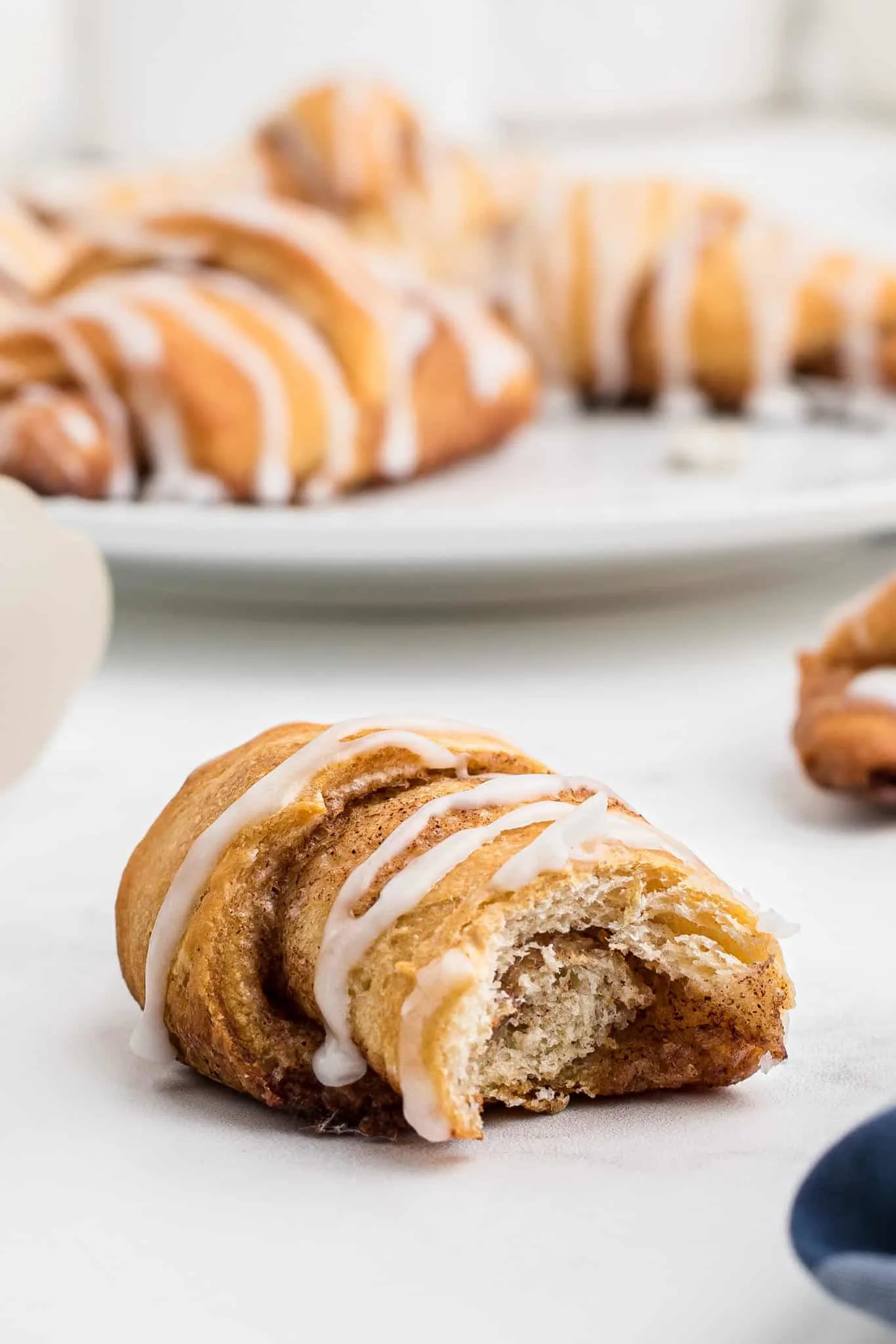 Cinnamon Crescent Rolls are an easy breakfast or dessert recipe using Pillsbury crescent rolls filled with a sweet cinnamon mixture and drizzled with icing.