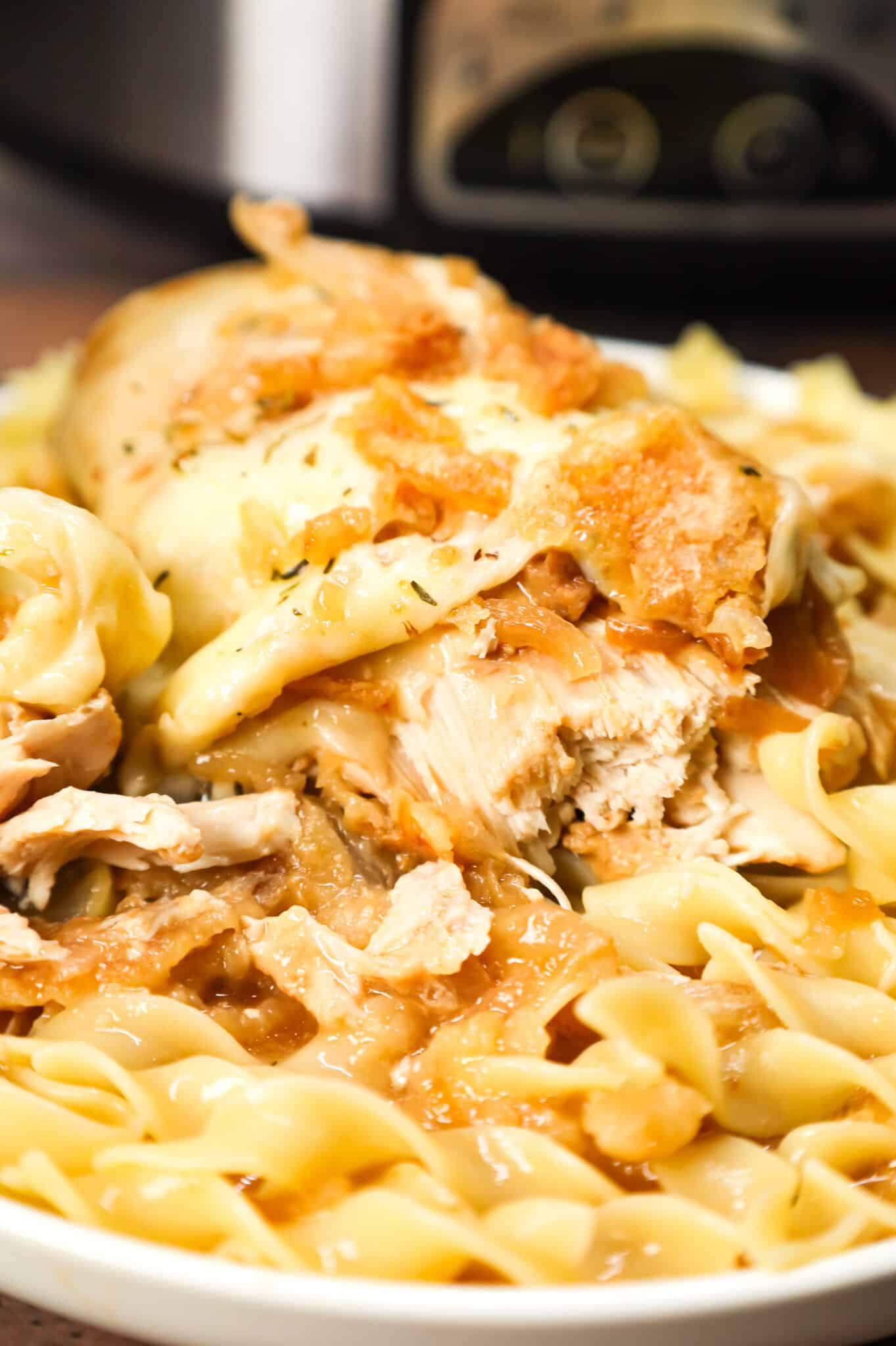 Crock Pot French Onion Chicken is an easy slow cooker chicken breasts recipe made with beef broth, onion soup mix, yellow onions, cream of chicken soup, provolone cheese and French's crispy fried onions.