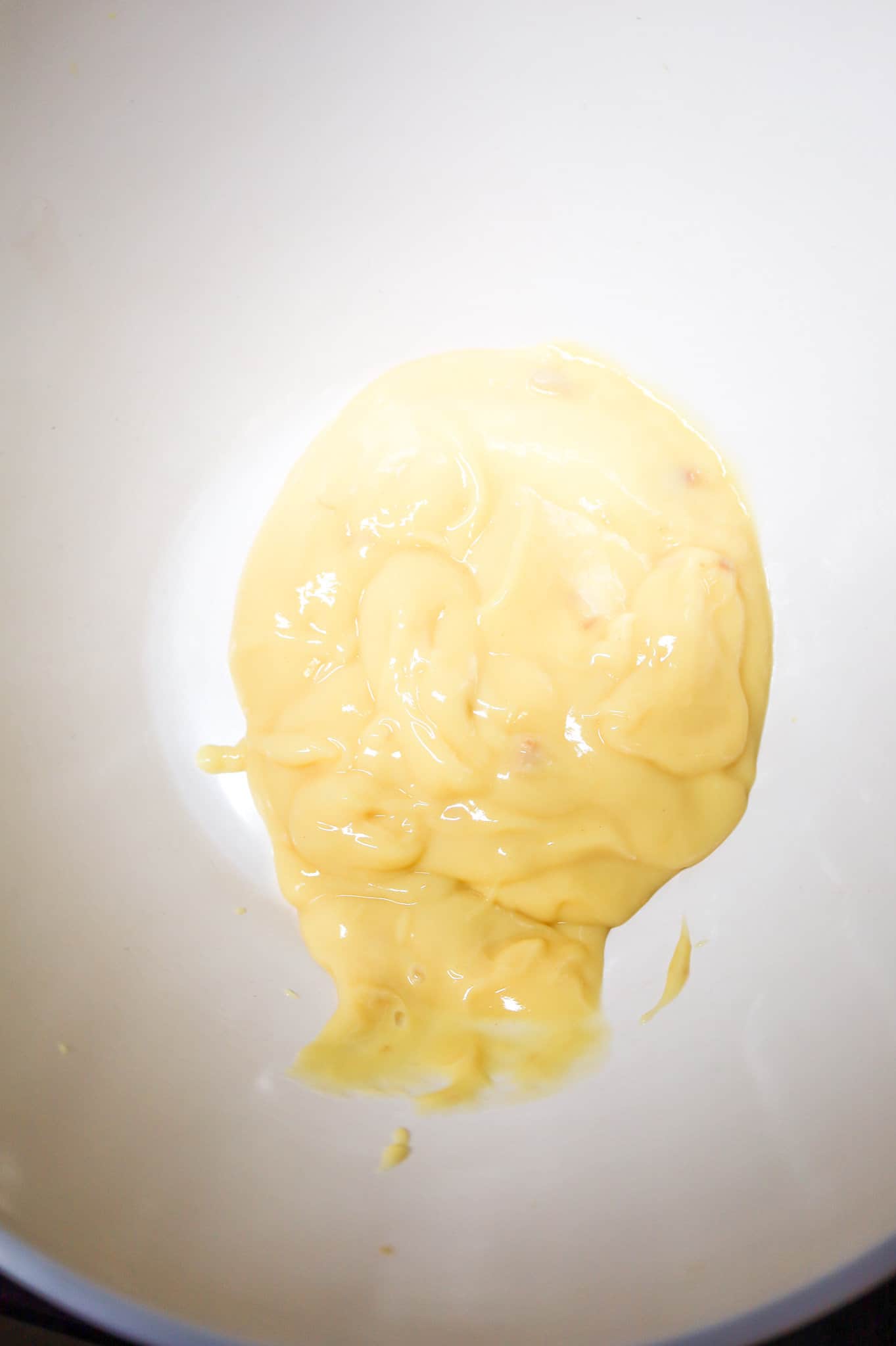 condensed cream of chicken soup in a mixing bowl