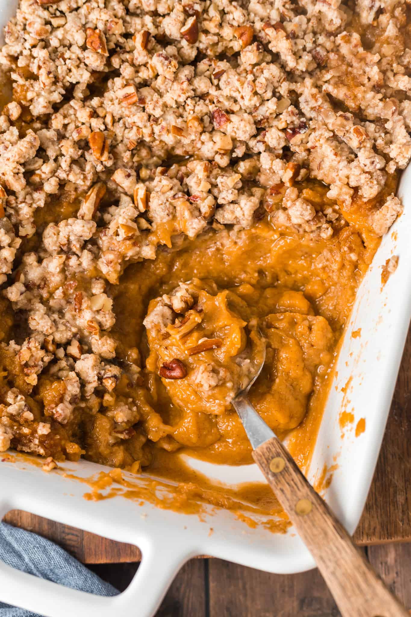 Easy Sweet Potato Casserole is a creamy sweet potato dish made with canned sweet potatoes and topped with a brown sugar pecan crumble.