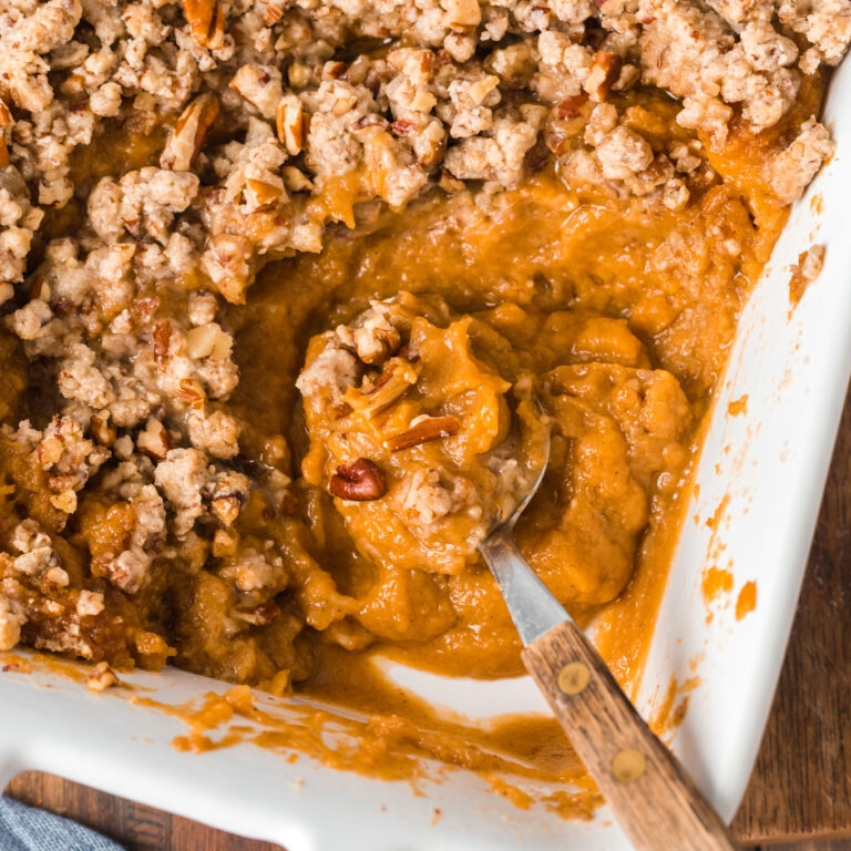 Easy Sweet Potato Casserole is a creamy sweet potato dish made with canned sweet potatoes and topped with a brown sugar pecan crumble.