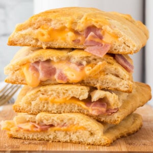 Ham and Cheese Hot Pockets are a kid friendly lunch or dinner recipe using Pillsbury crescent rolls, American cheese slices and chopped ham slices.