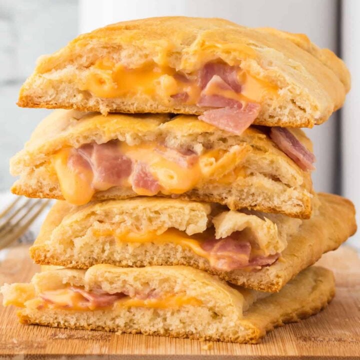 Ham and Cheese Hot Pockets are a kid friendly lunch or dinner recipe using Pillsbury crescent rolls, American cheese slices and chopped ham slices.