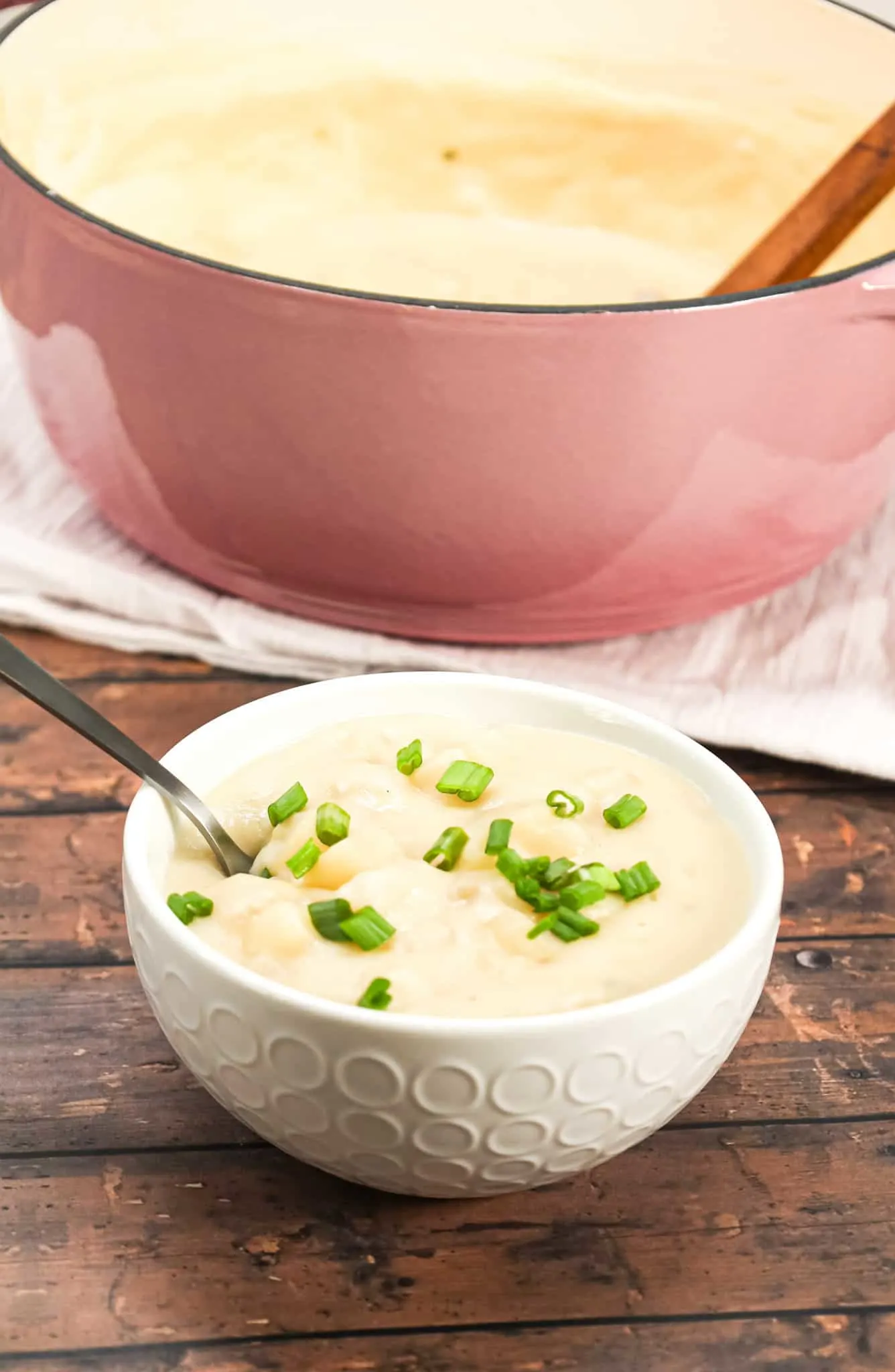 4 Ingredient Potato Soup is a simple hearty soup recipe made with roasted garlic flavoured instant mashed potatoes, frozen diced hashbrown potatoes, milk and chicken broth.