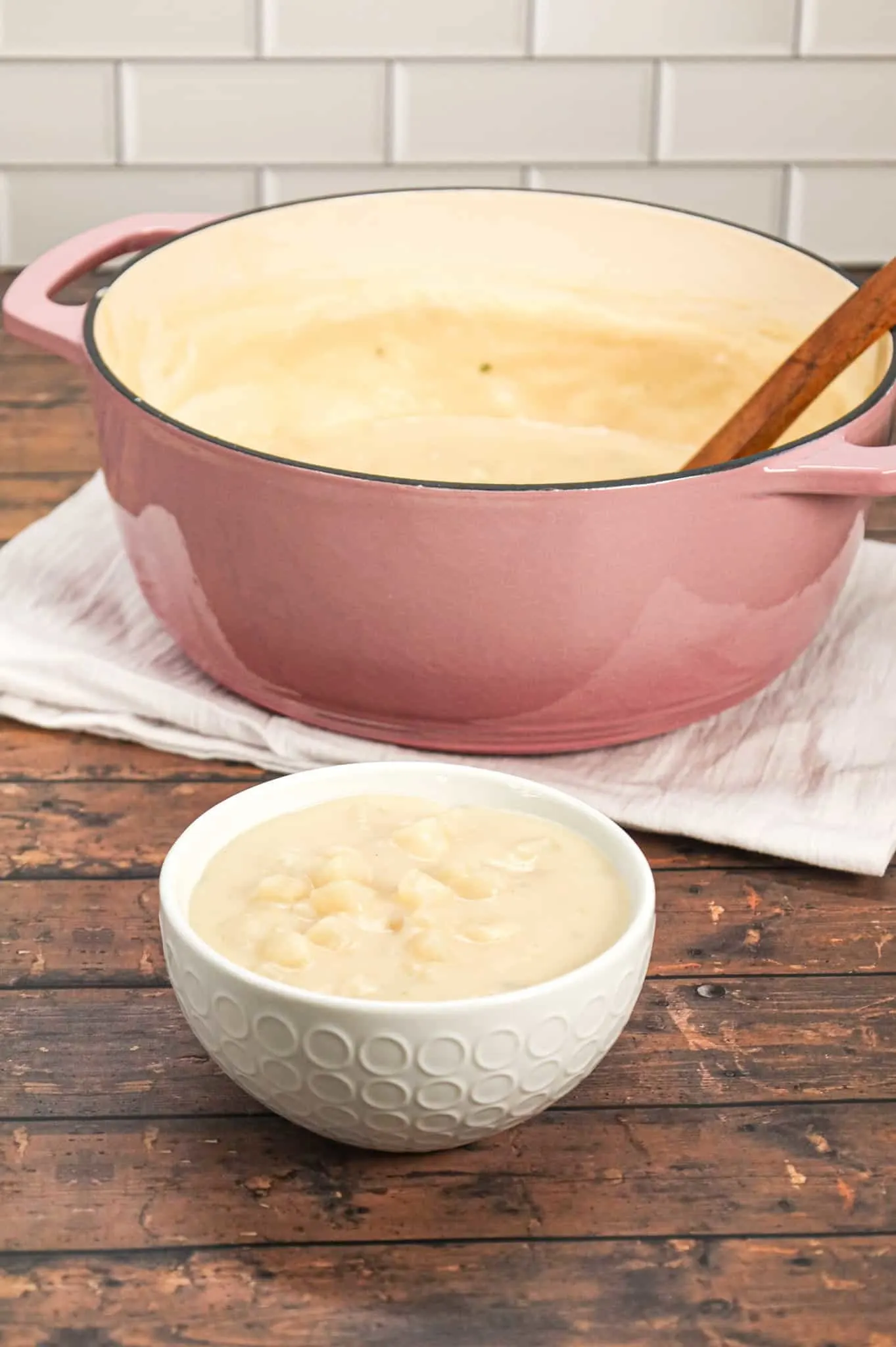 4 Ingredient Potato Soup is a simple hearty soup recipe made with roasted garlic flavoured instant mashed potatoes, frozen diced hashbrown potatoes, milk and chicken broth.