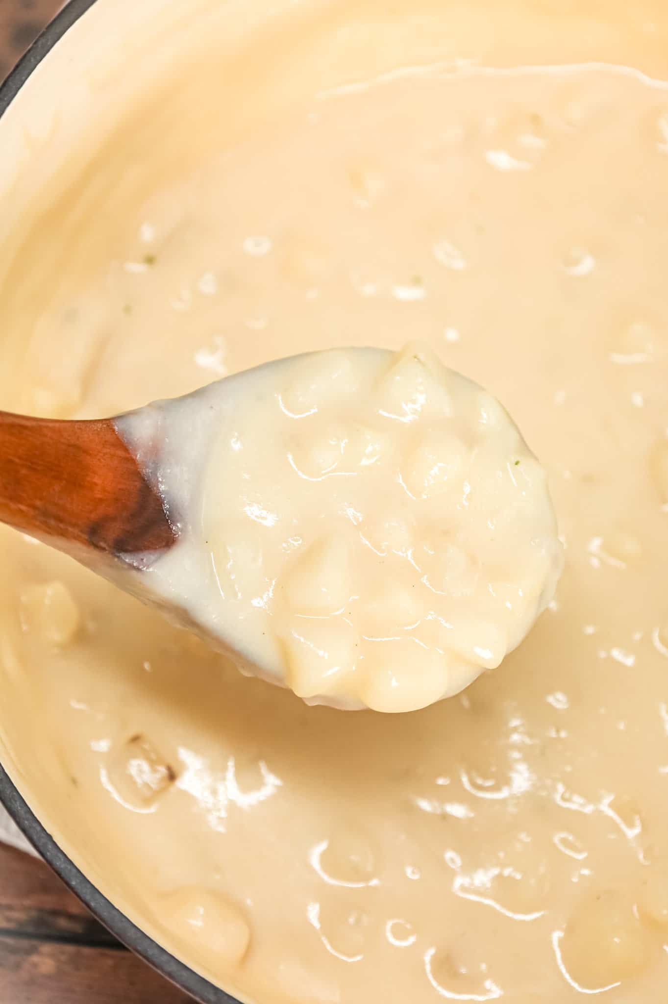 4 Ingredient Potato Soup is a simple hearty soup recipe made with roasted garlic flavoured instant mashed potatoes, frozen diced hashbrown potatoes, milk and chicken broth.