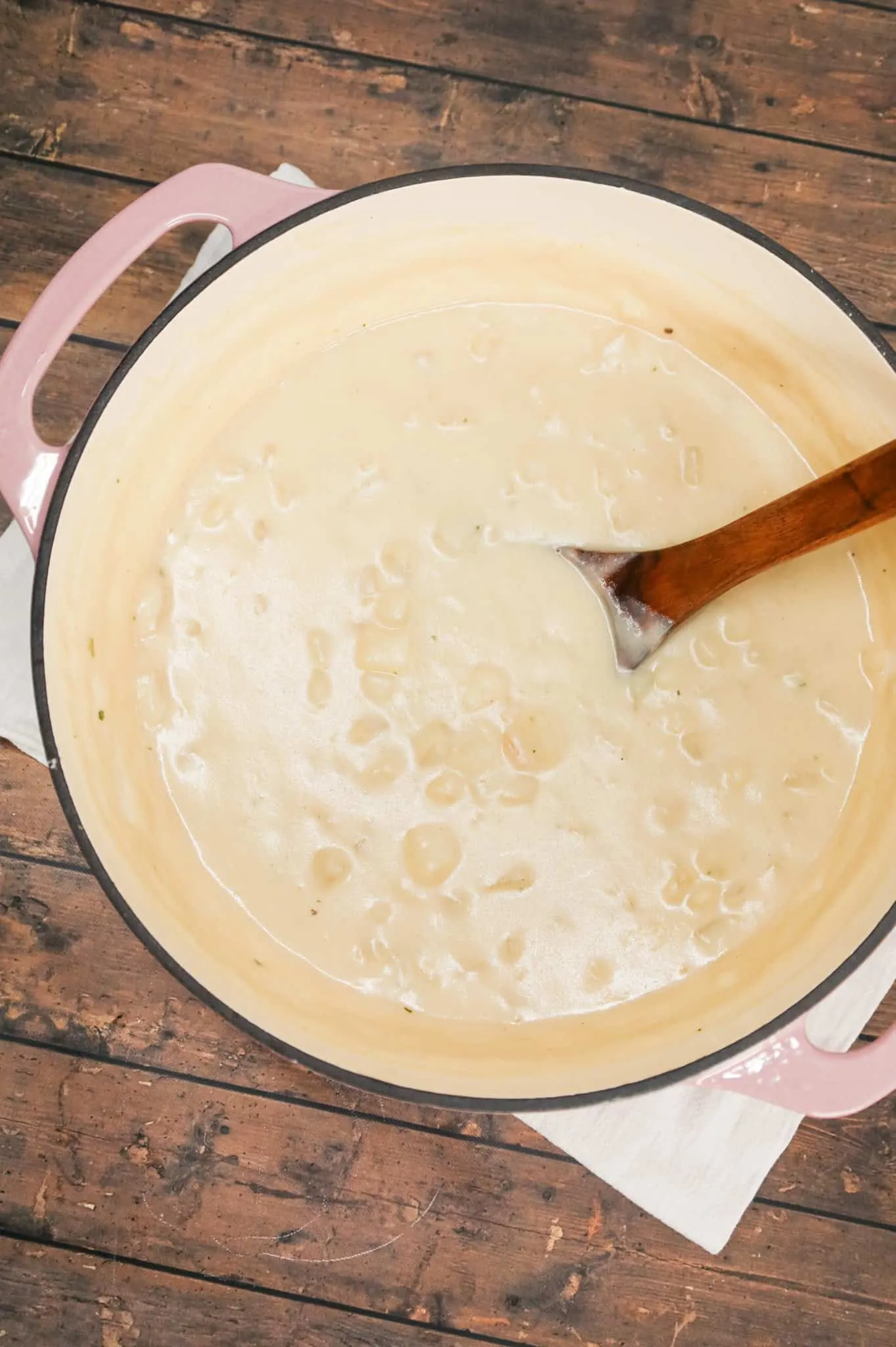 4 Ingredient Potato Soup is a simple hearty soup recipe made with roasted garlic flavoured instant mashed potatoes, frozen diced hashbrown potatoes, milk and chicken broth.